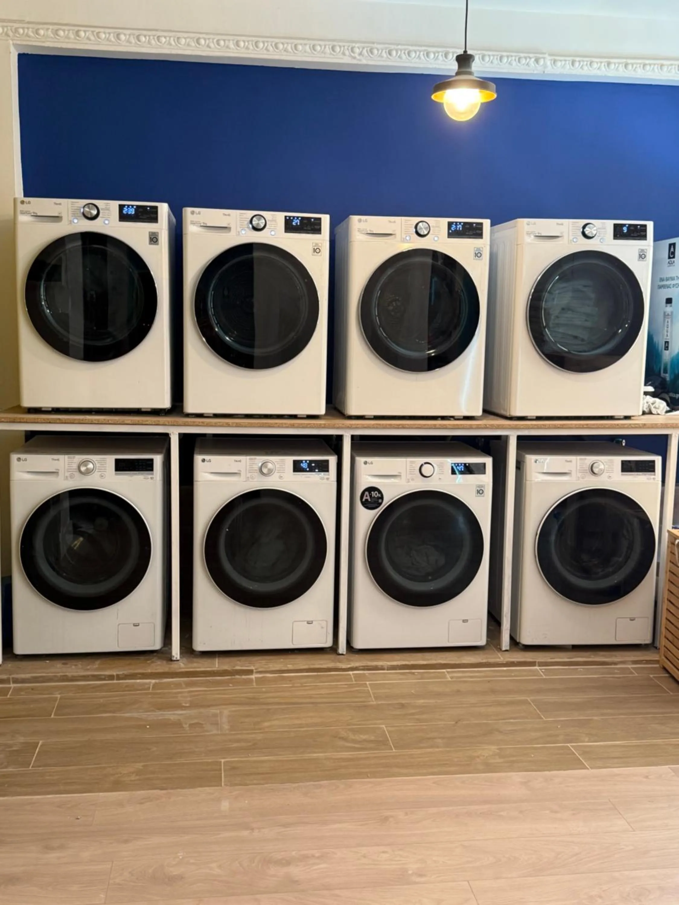 washing machine in The Maroon Bottle Luxury Suites
