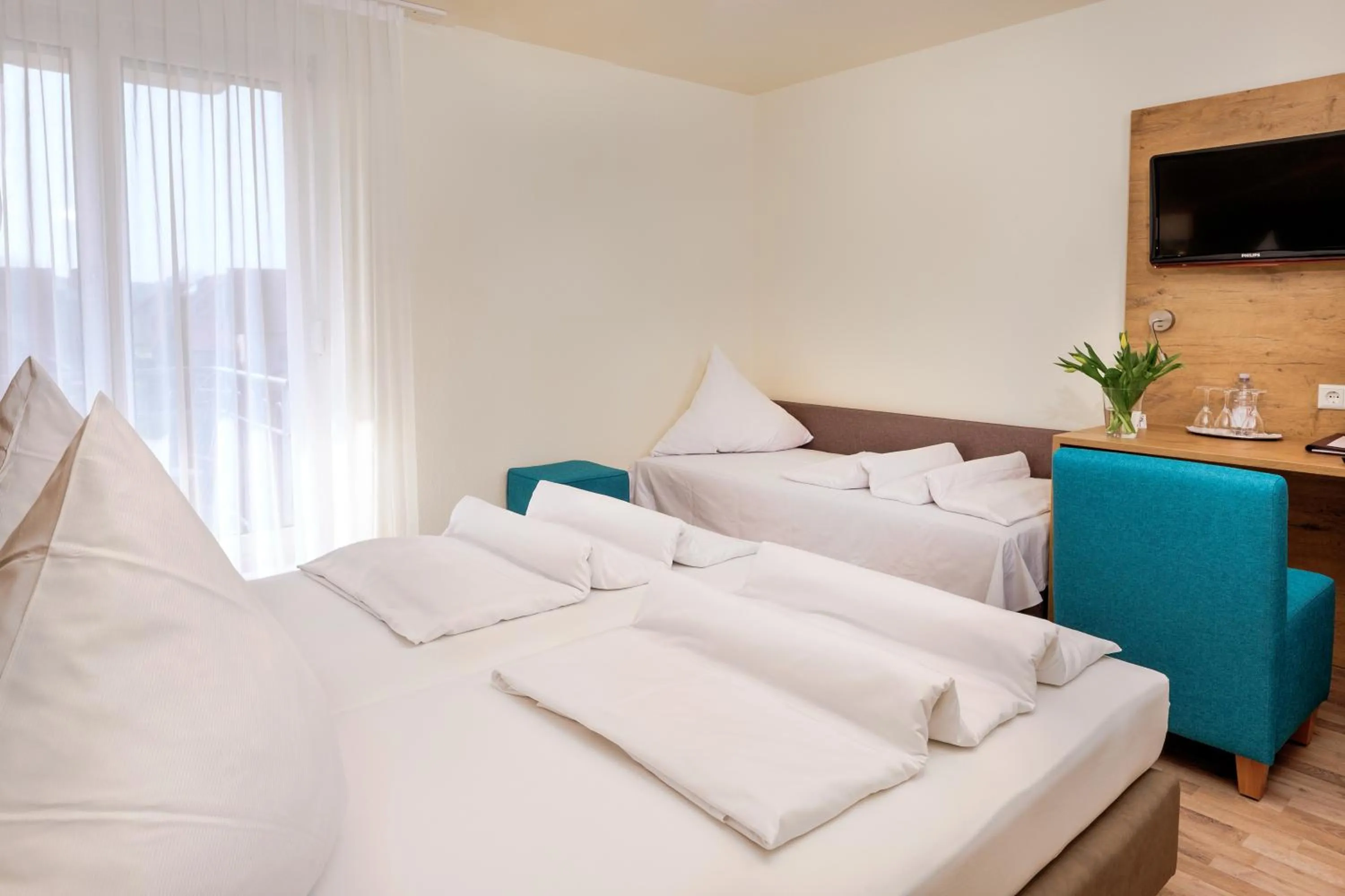 Photo of the whole room, Bed in Hotel Mythos