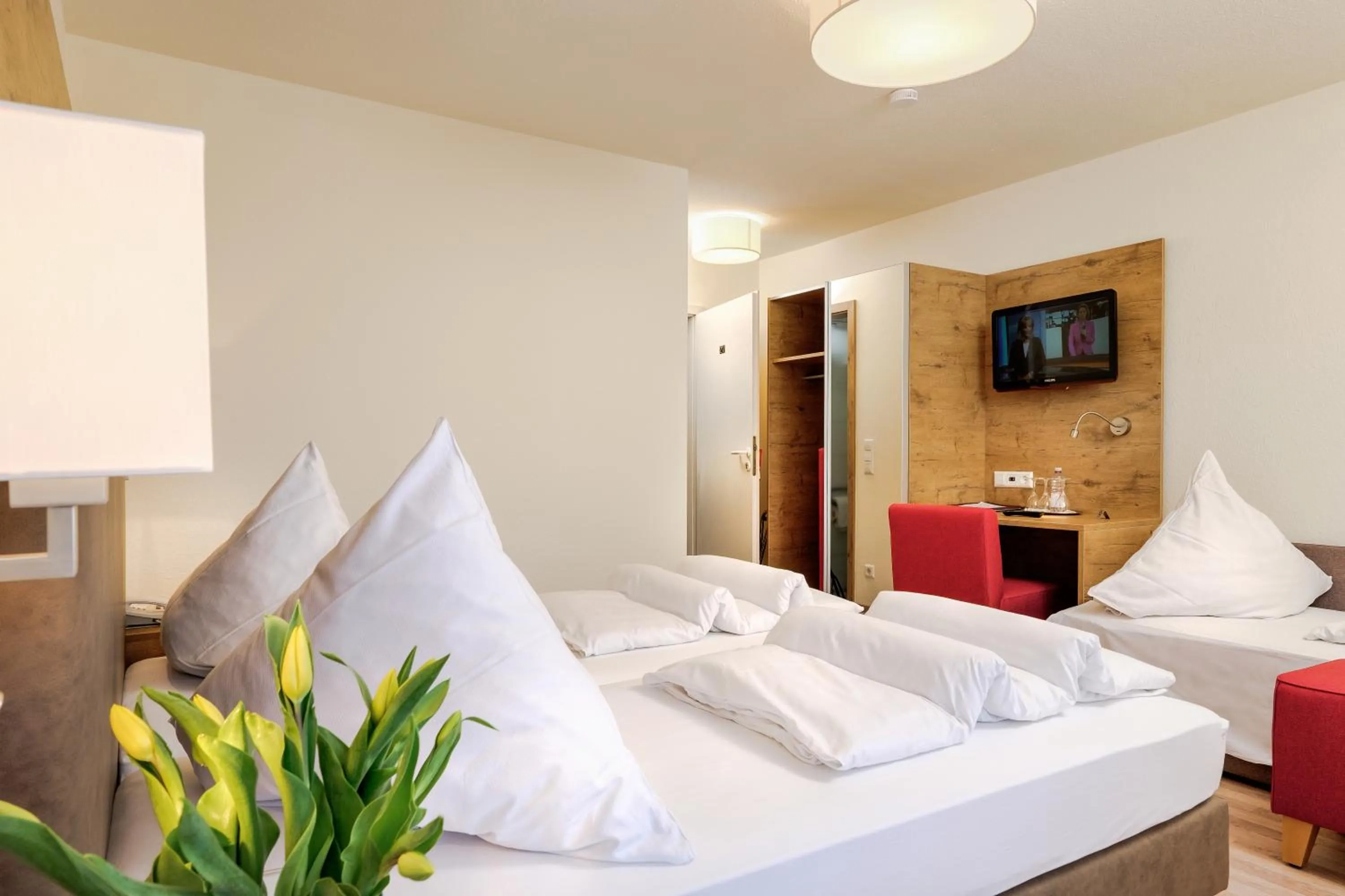 Photo of the whole room, Bed in Hotel Mythos