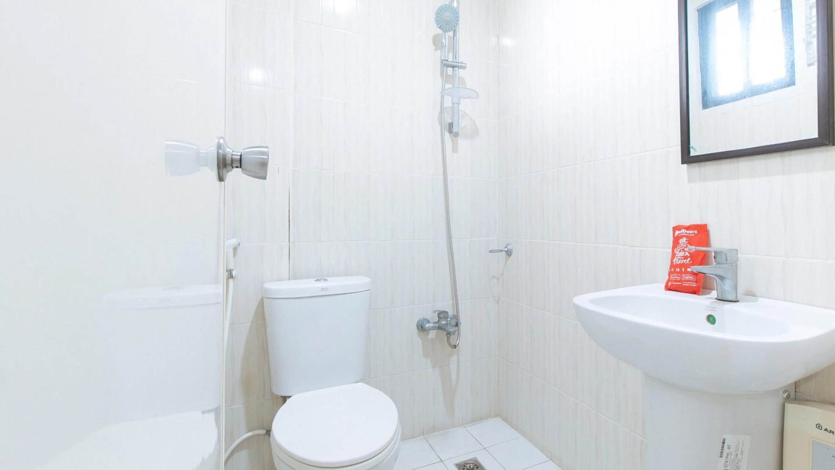 Shower in RedDoorz at RJs Bldg near Lyceum Gen Trias Cavite
