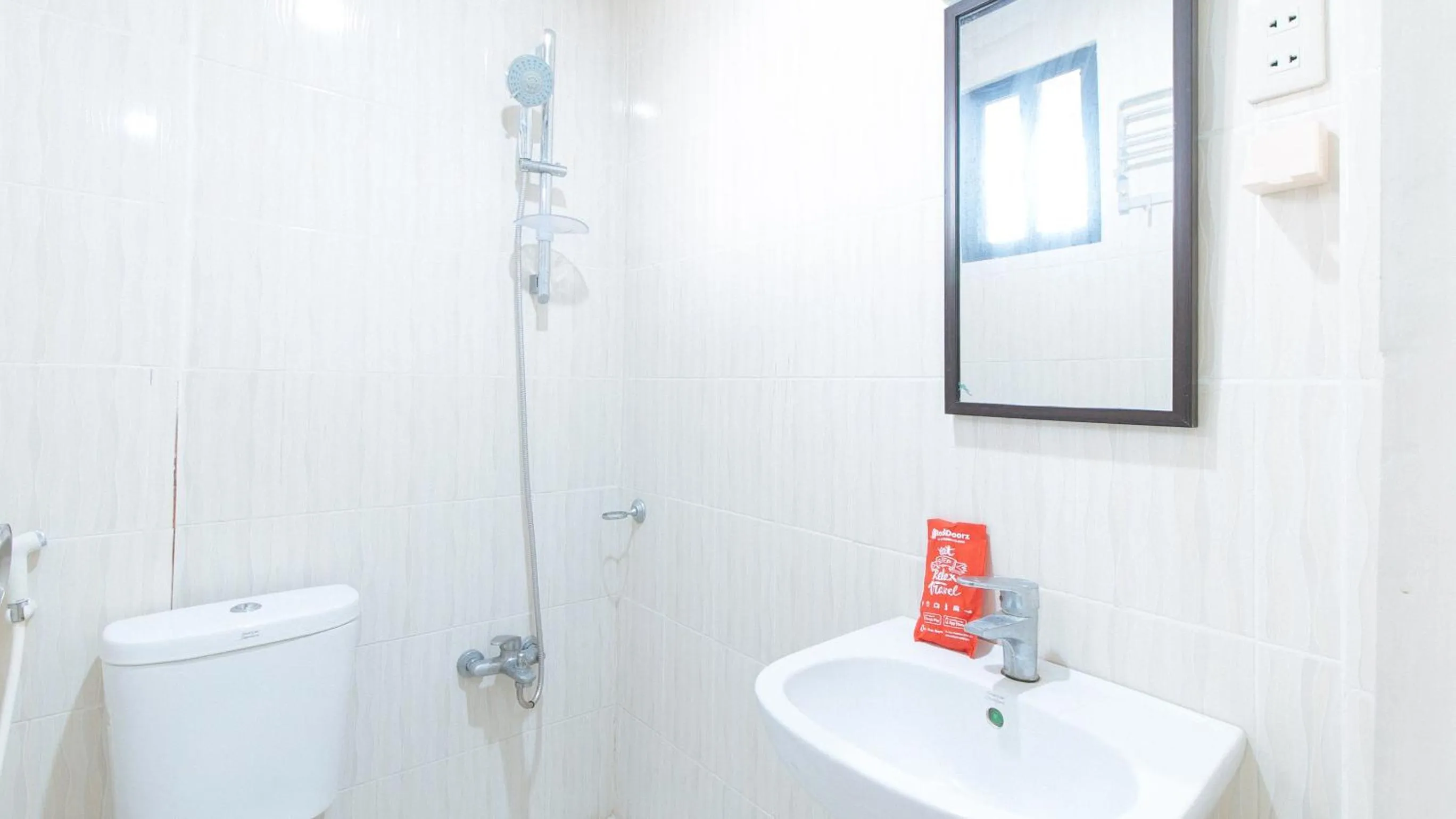 Shower in RedDoorz at RJs Bldg near Lyceum Gen Trias Cavite