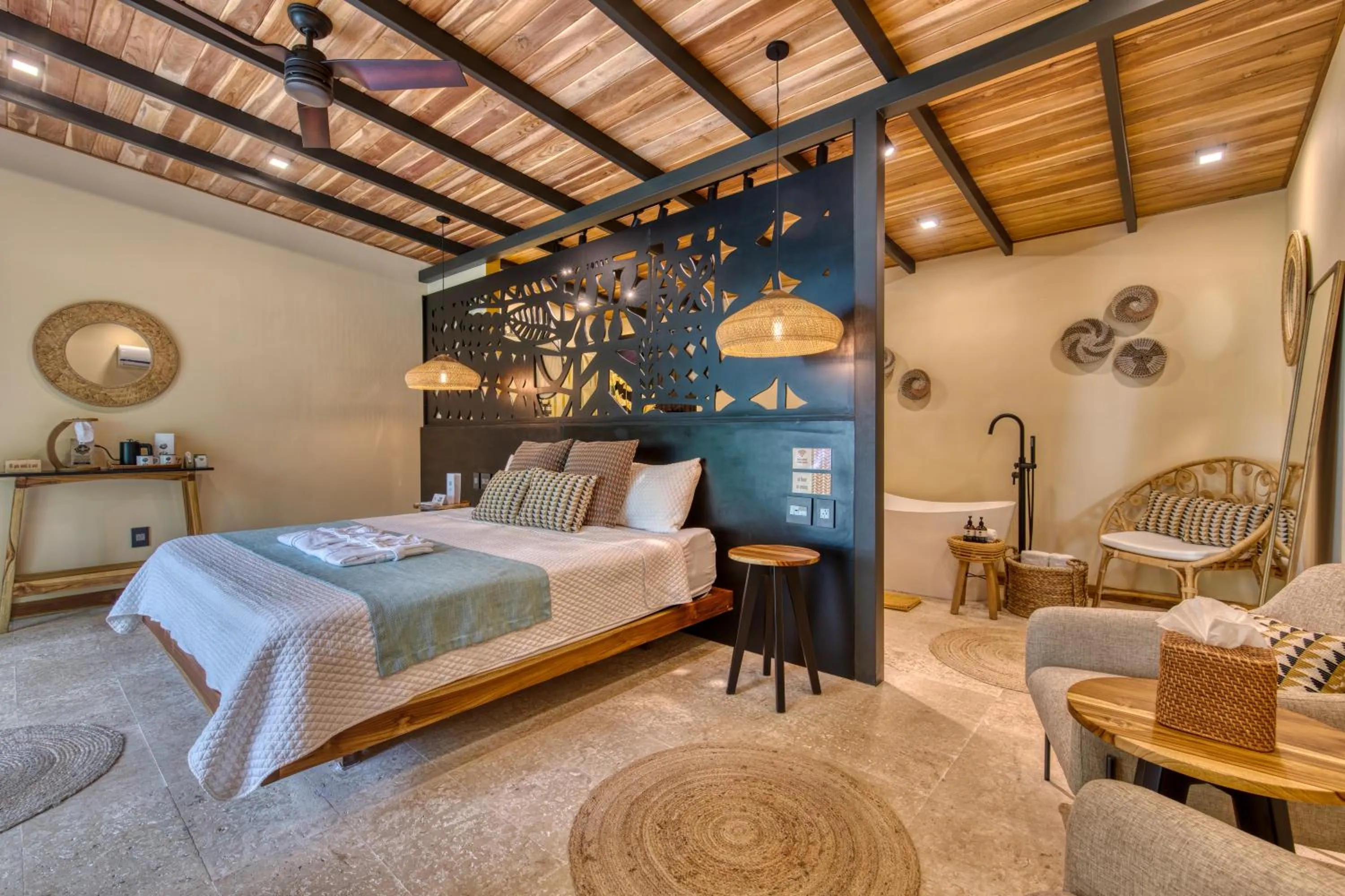 Bed in awā Beachfront Hotel