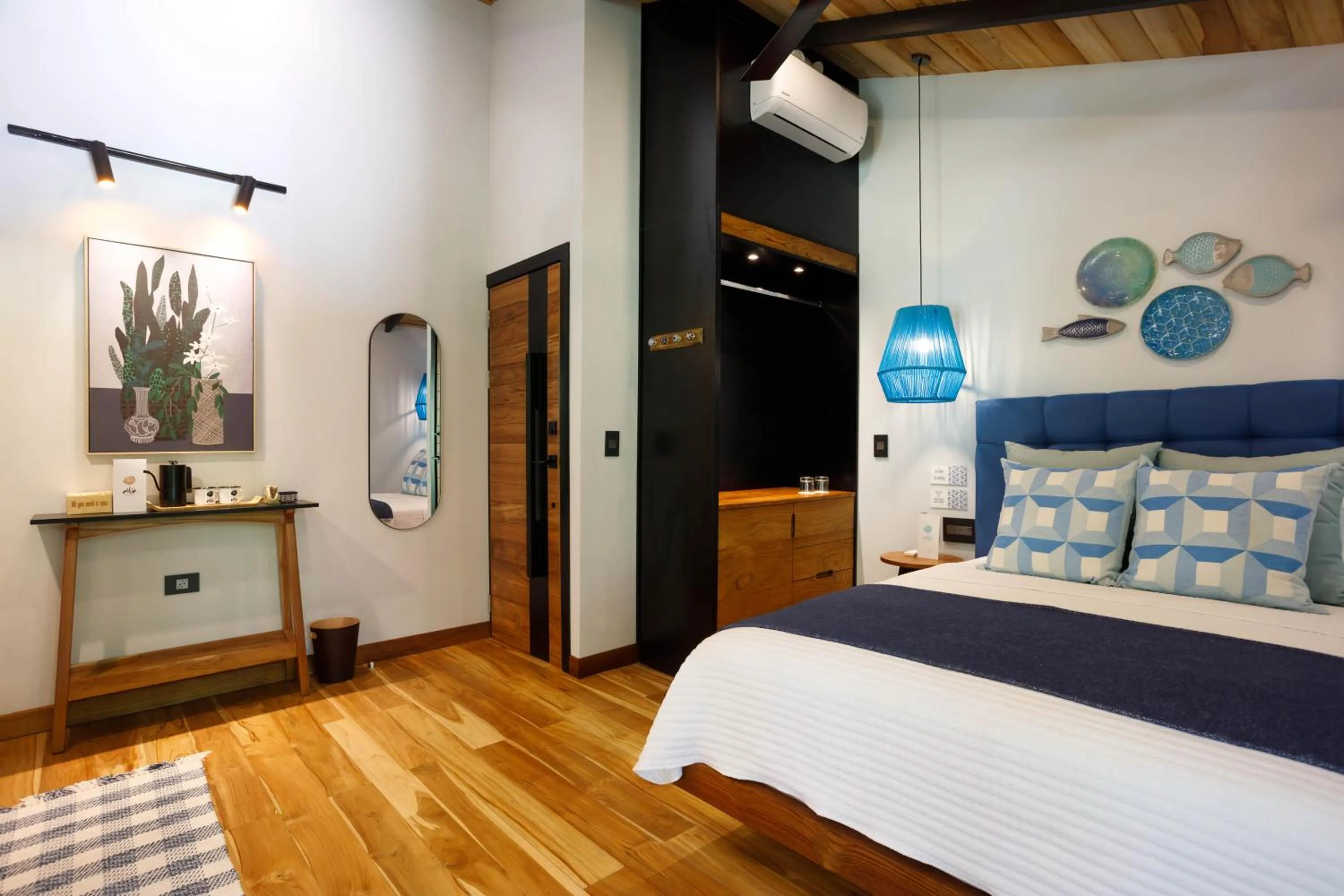 Bed in awā Beachfront Hotel