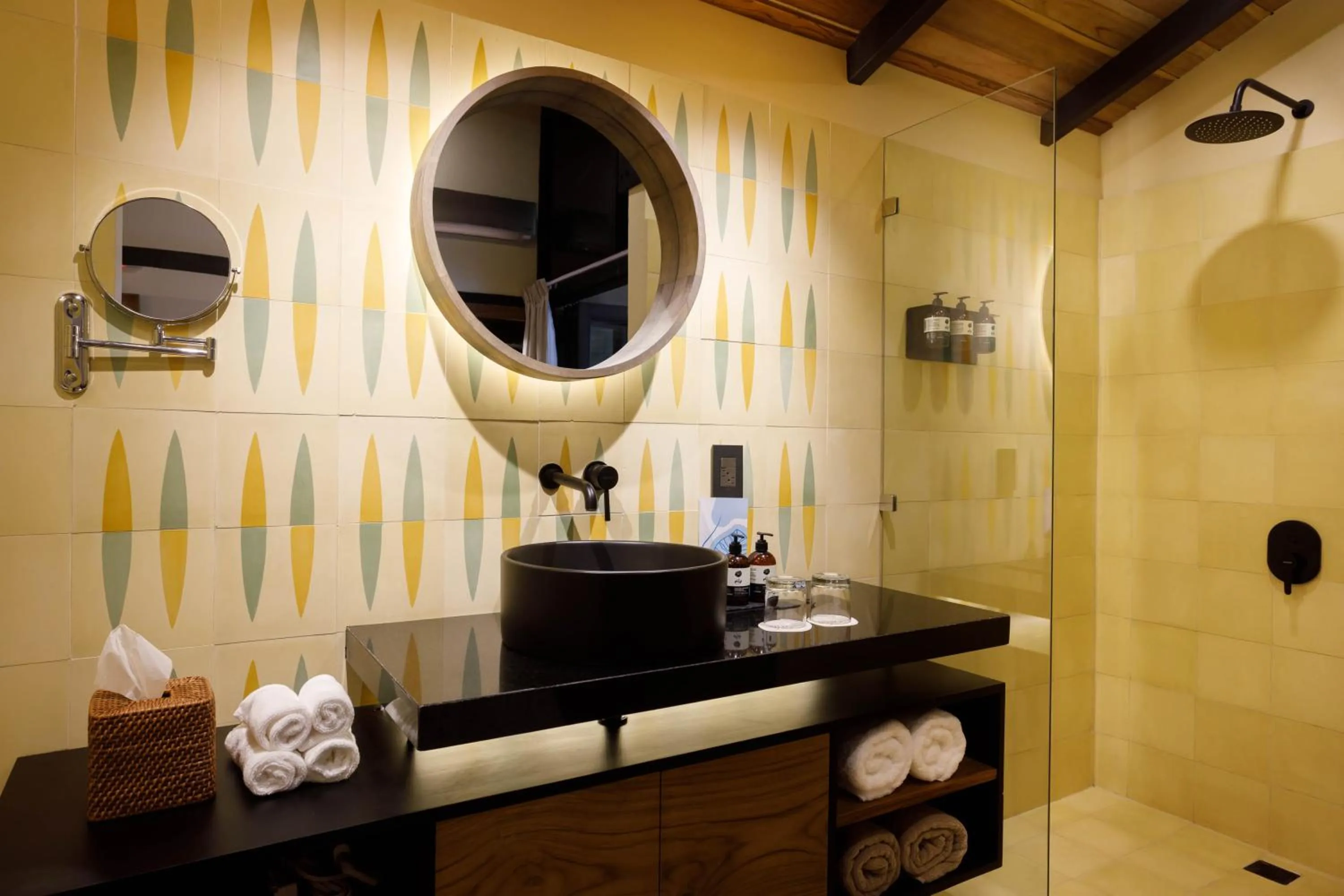 Bathroom in awā Beachfront Hotel