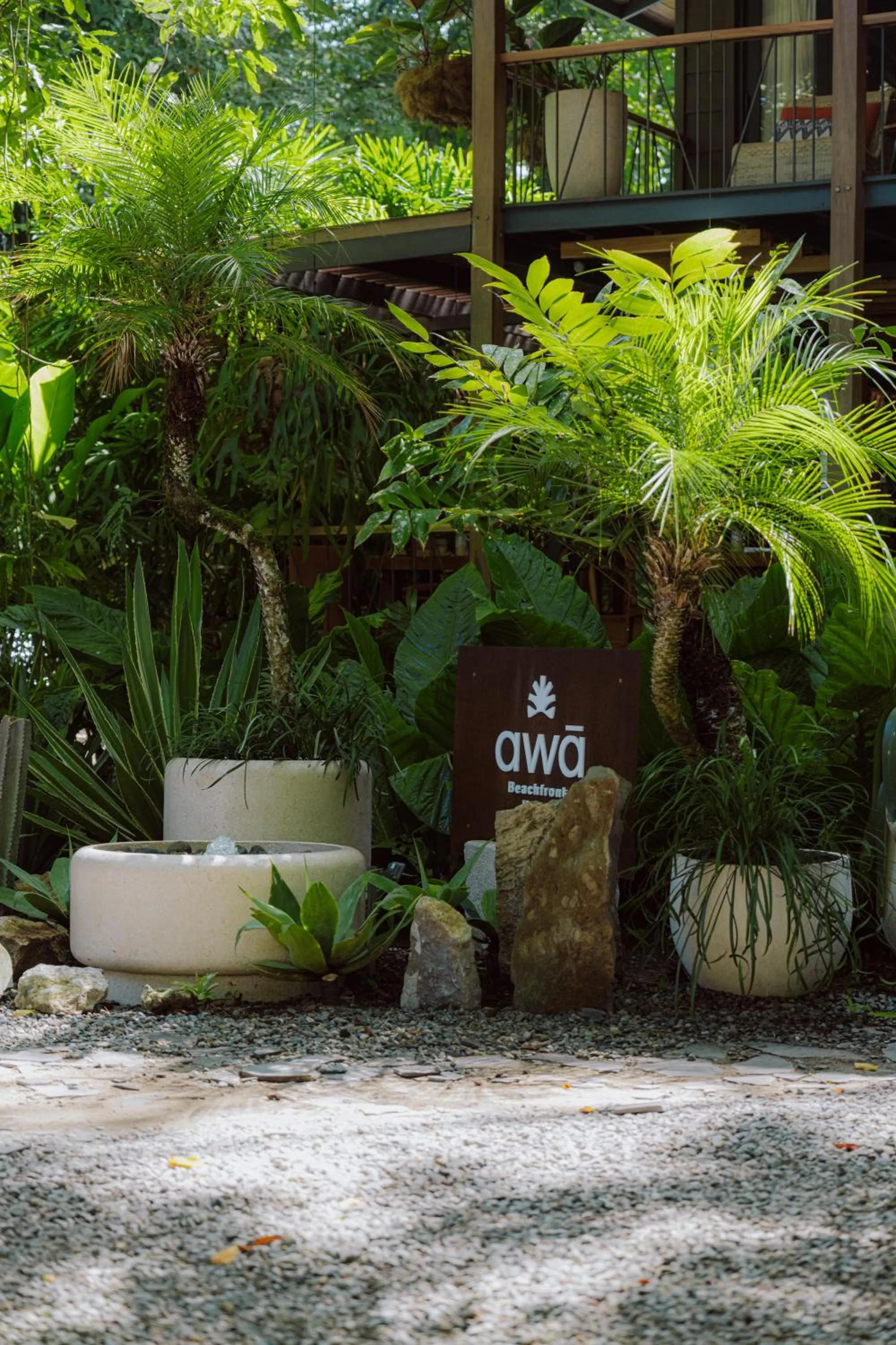 Property logo or sign in awā Beachfront Hotel
