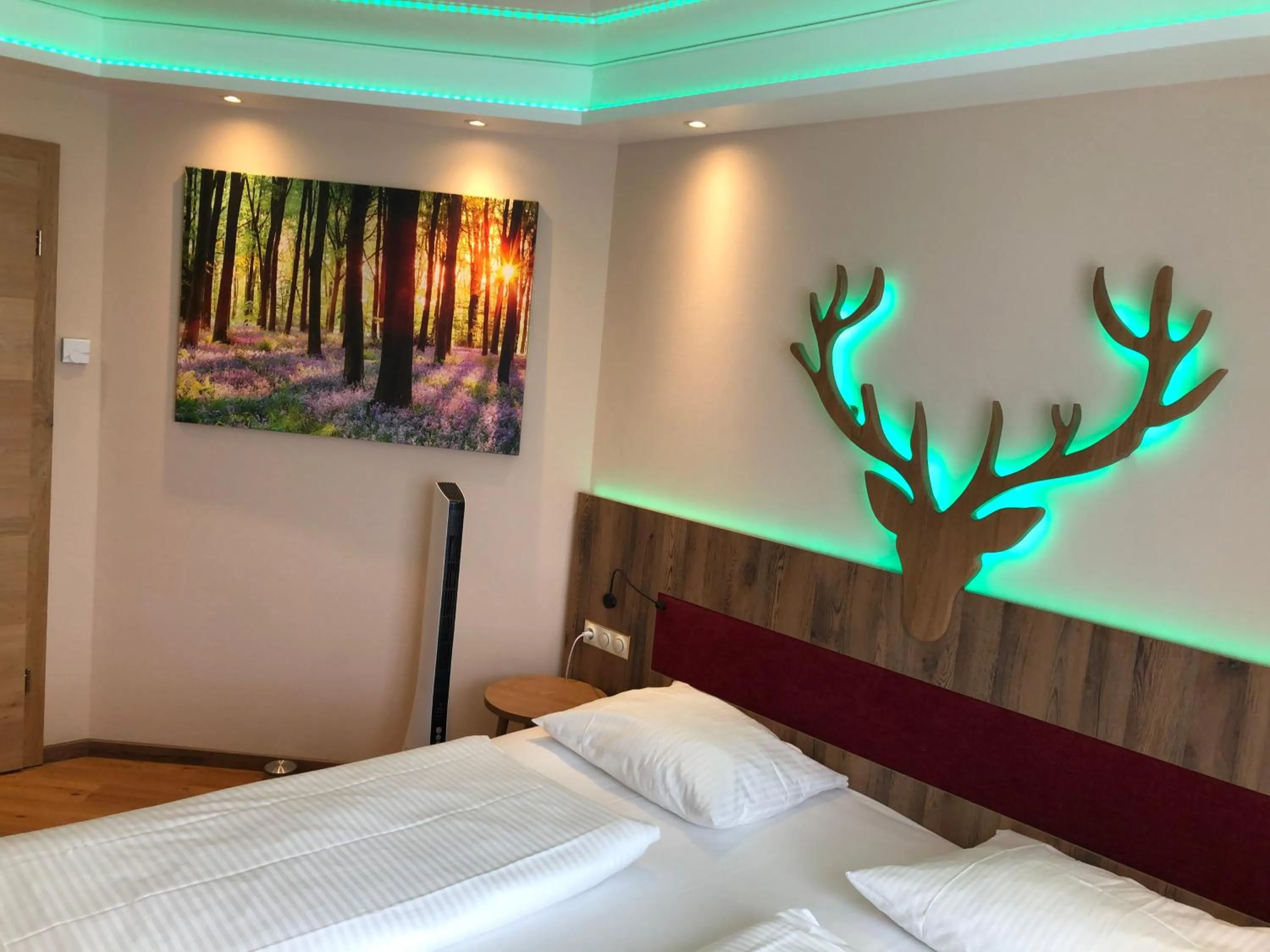 Bed in Hotel Sperling mit E-Ladestation