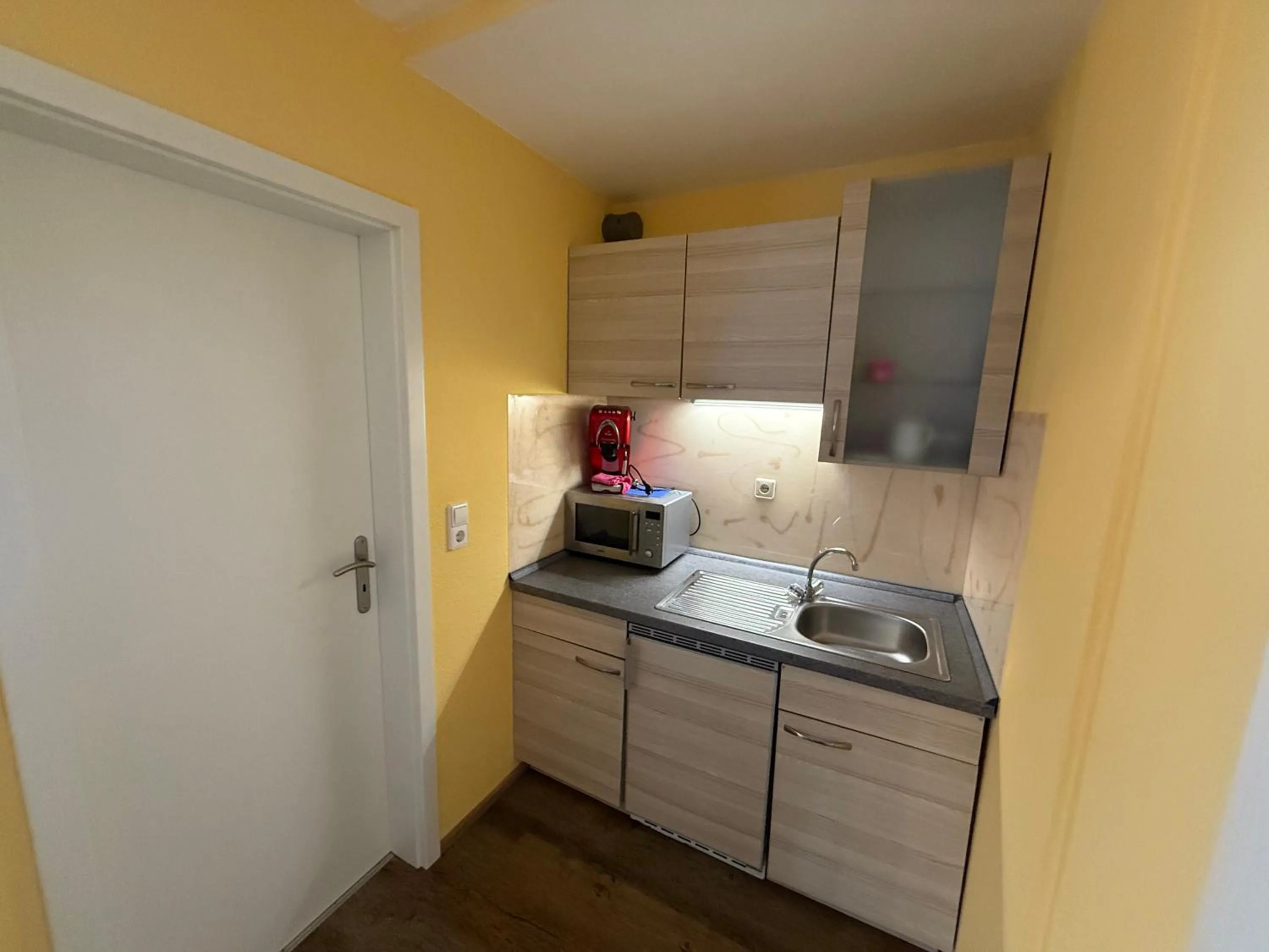 Kitchen or kitchenette in Hotel am Hindenburgplatz