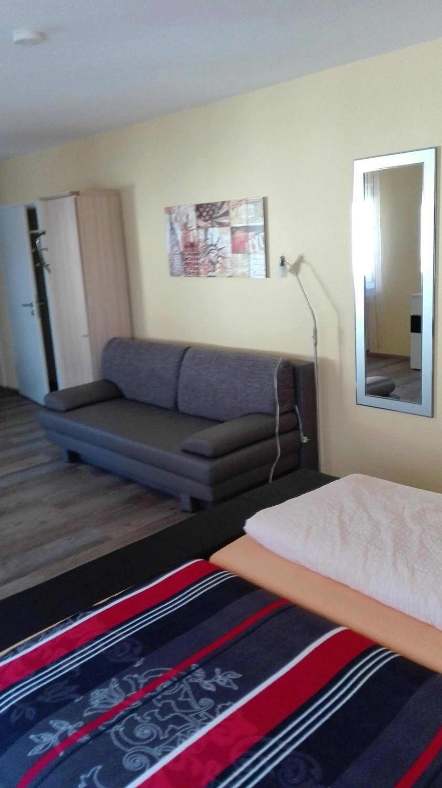 Living room, Bed in Hotel am Hindenburgplatz