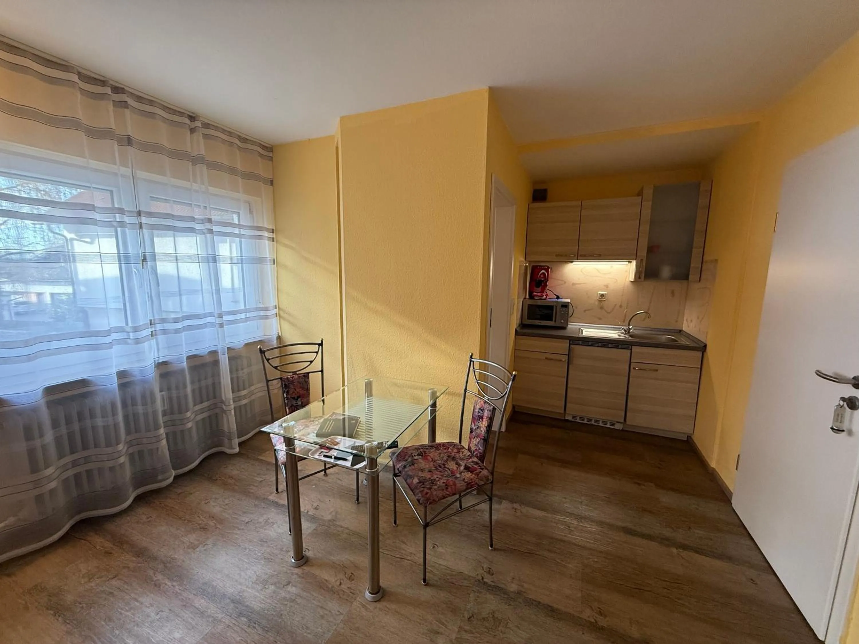 Kitchen or kitchenette in Hotel am Hindenburgplatz