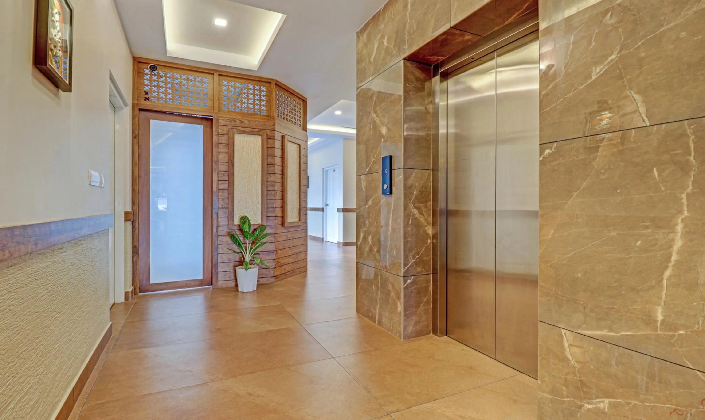 elevator in Treebo Golden Terminal, Kochi Airport