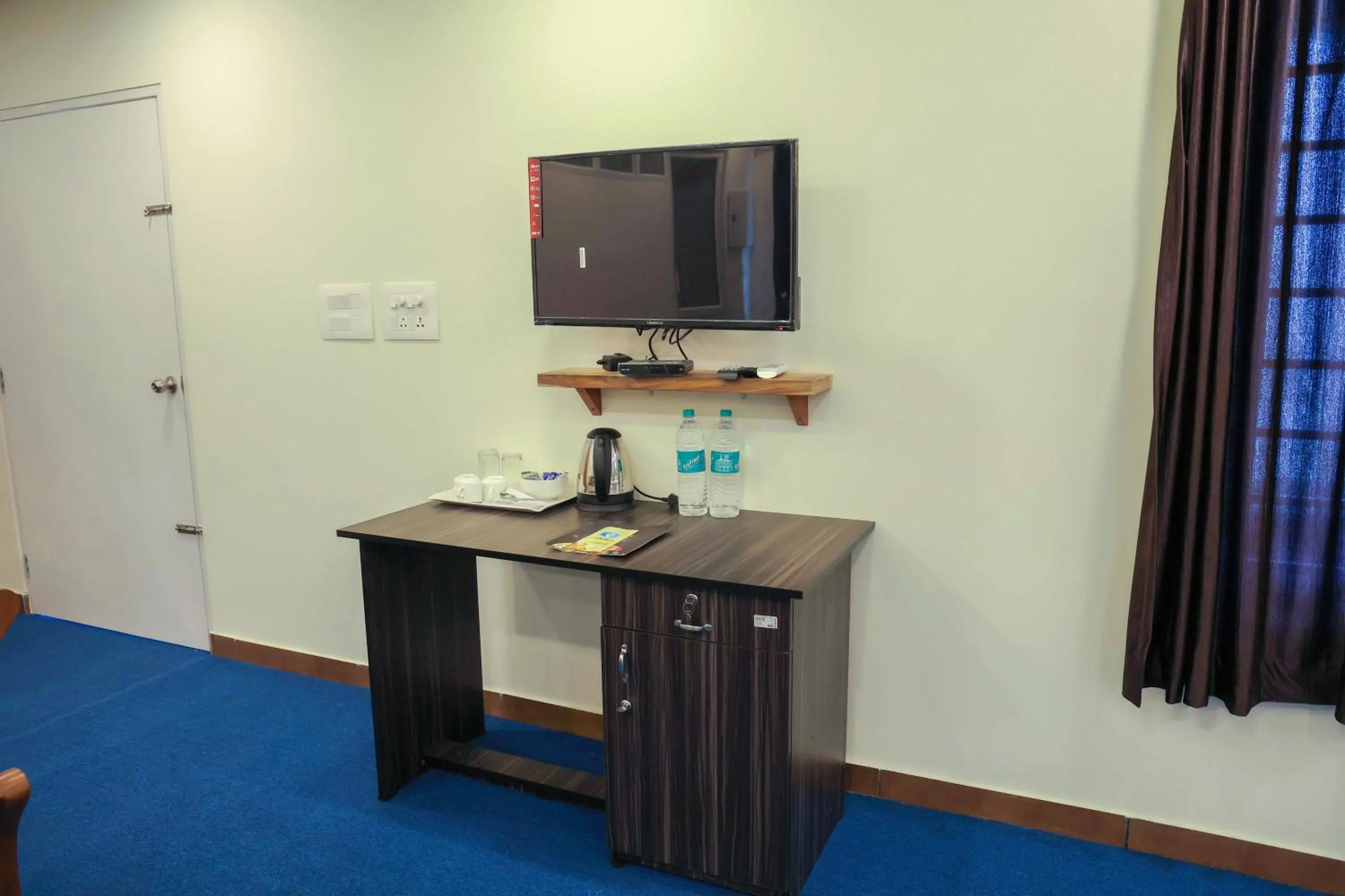 Bedroom in Treebo Golden Terminal, Kochi Airport