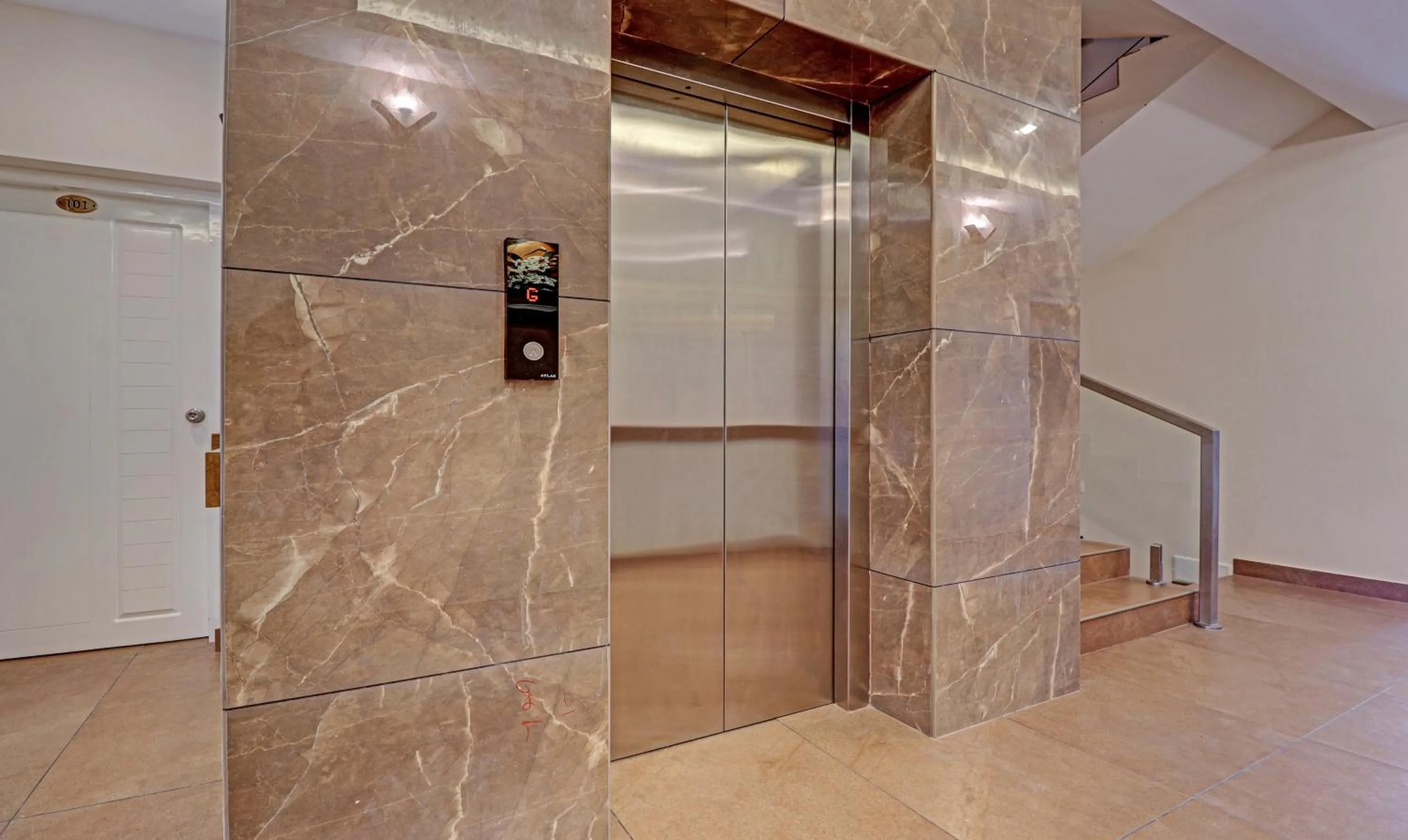 elevator in Treebo Golden Terminal, Kochi Airport