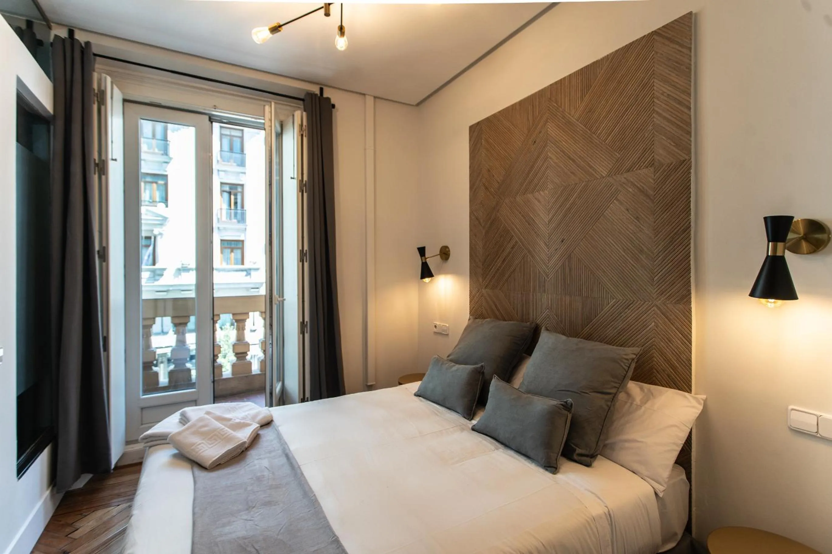 Bed in SUITES YOU Gran Vía