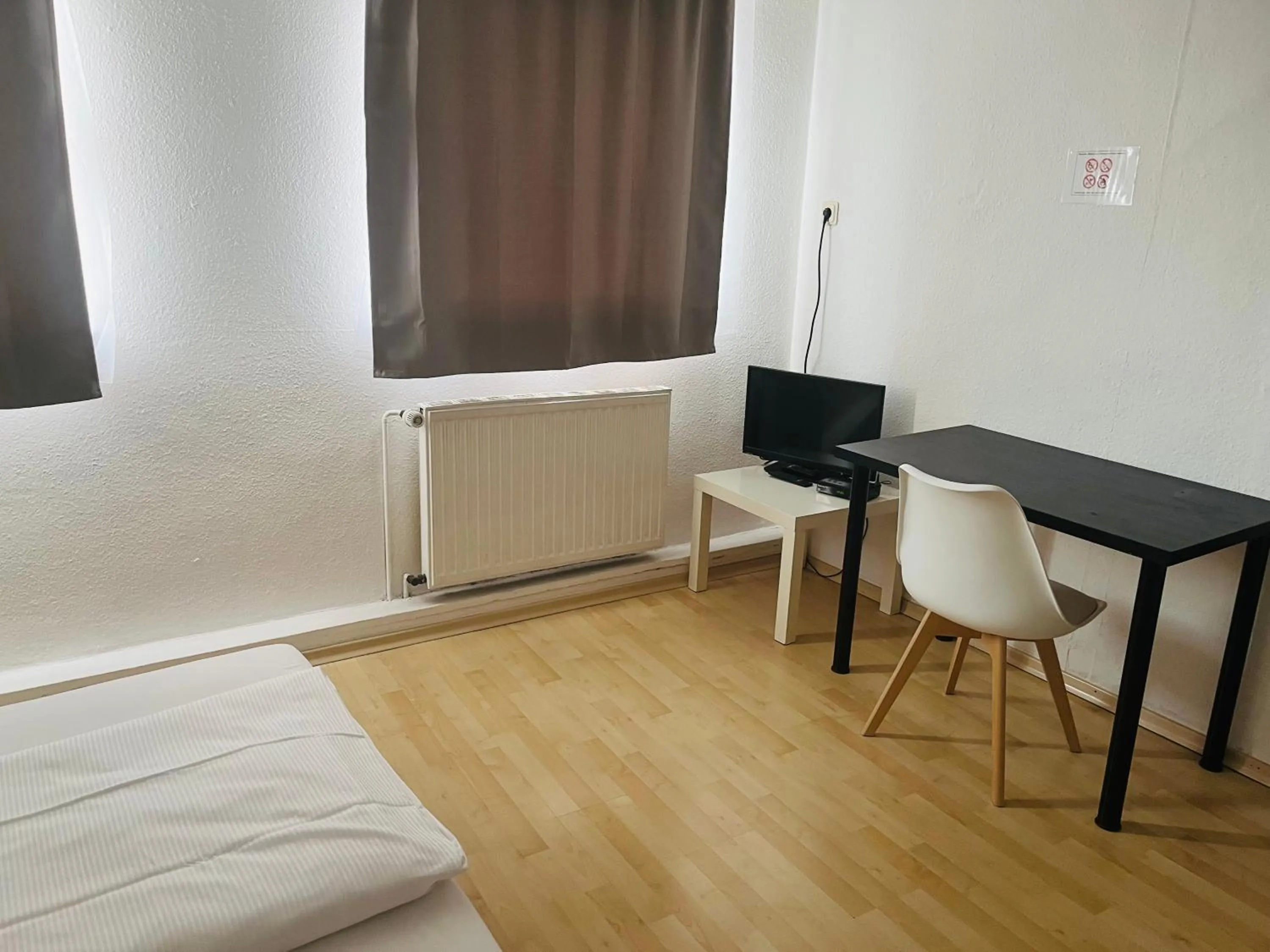 Photo of the whole room, Bed in Hotel Westend