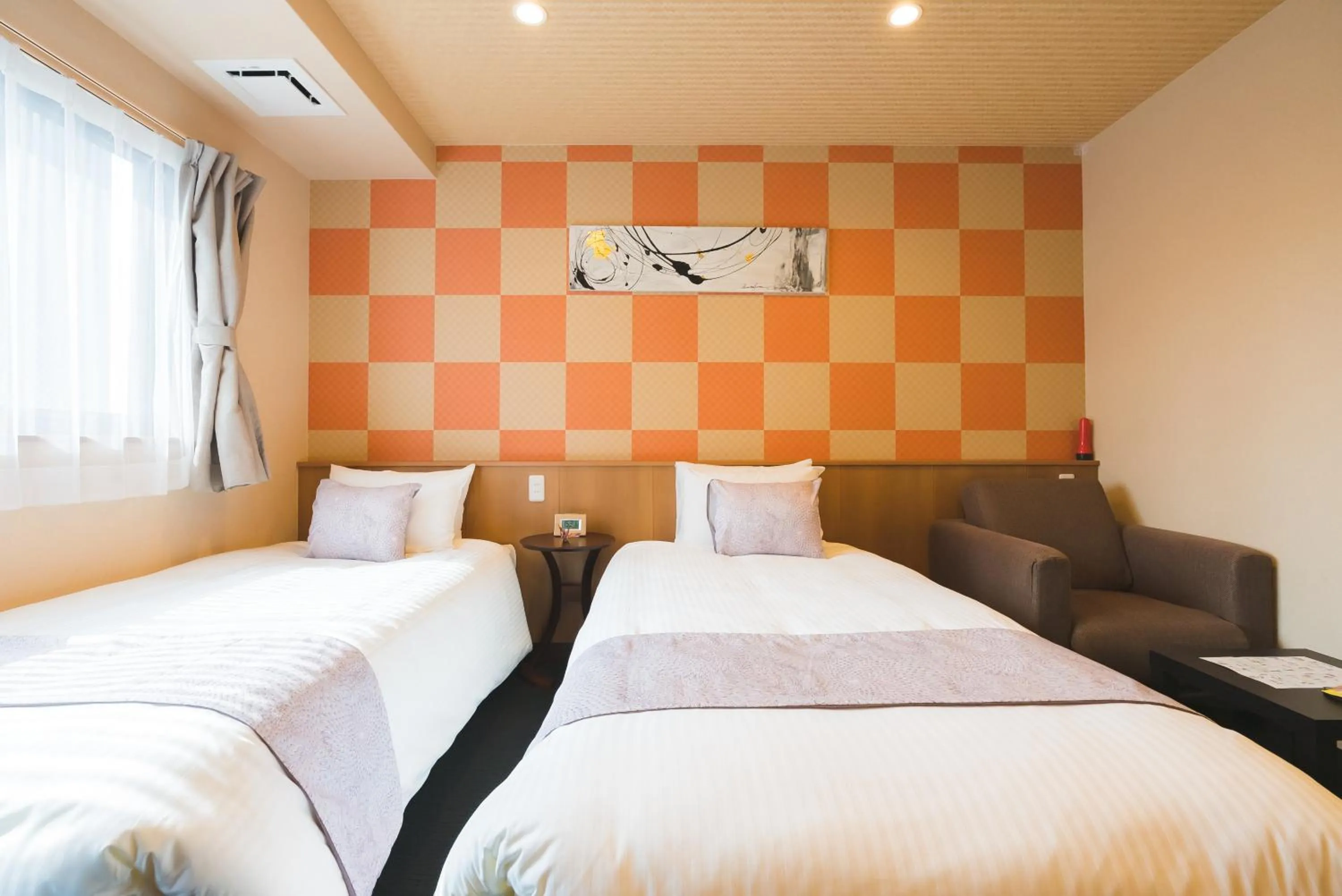 Bed in Kyoto Earth Hotel