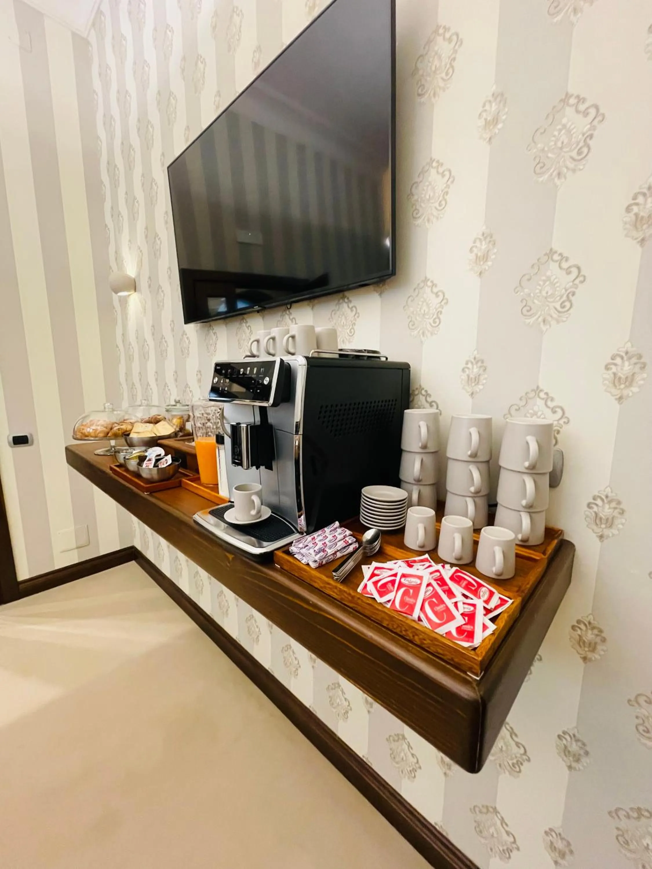 Communal lounge/ TV room in L’Arco Bed&Breakfast