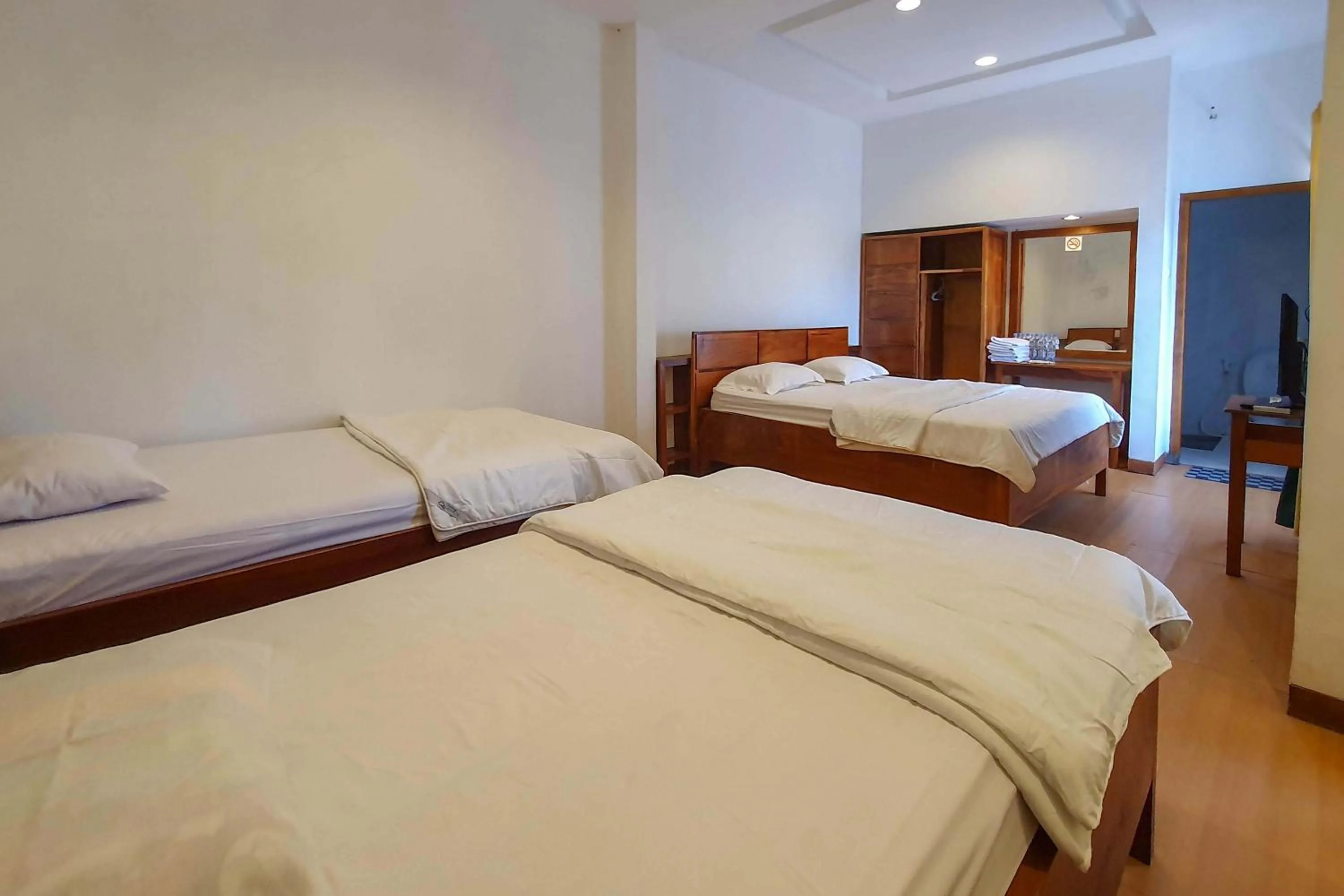 Bed in Rumah Eyang Tardjo Syariah Mitra RedDoorz