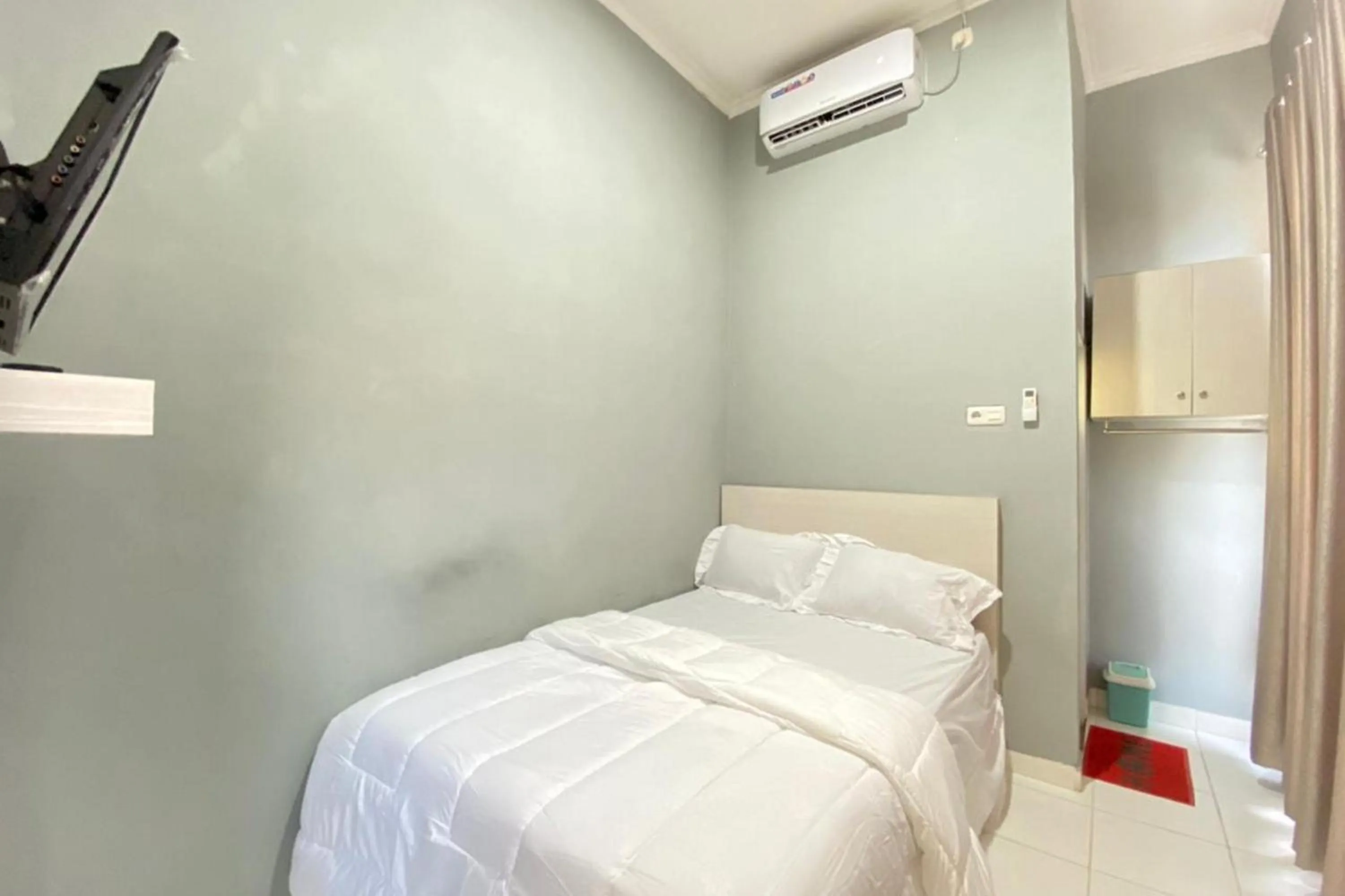 Bed in Pelangi Guest House Palembang RedPartner