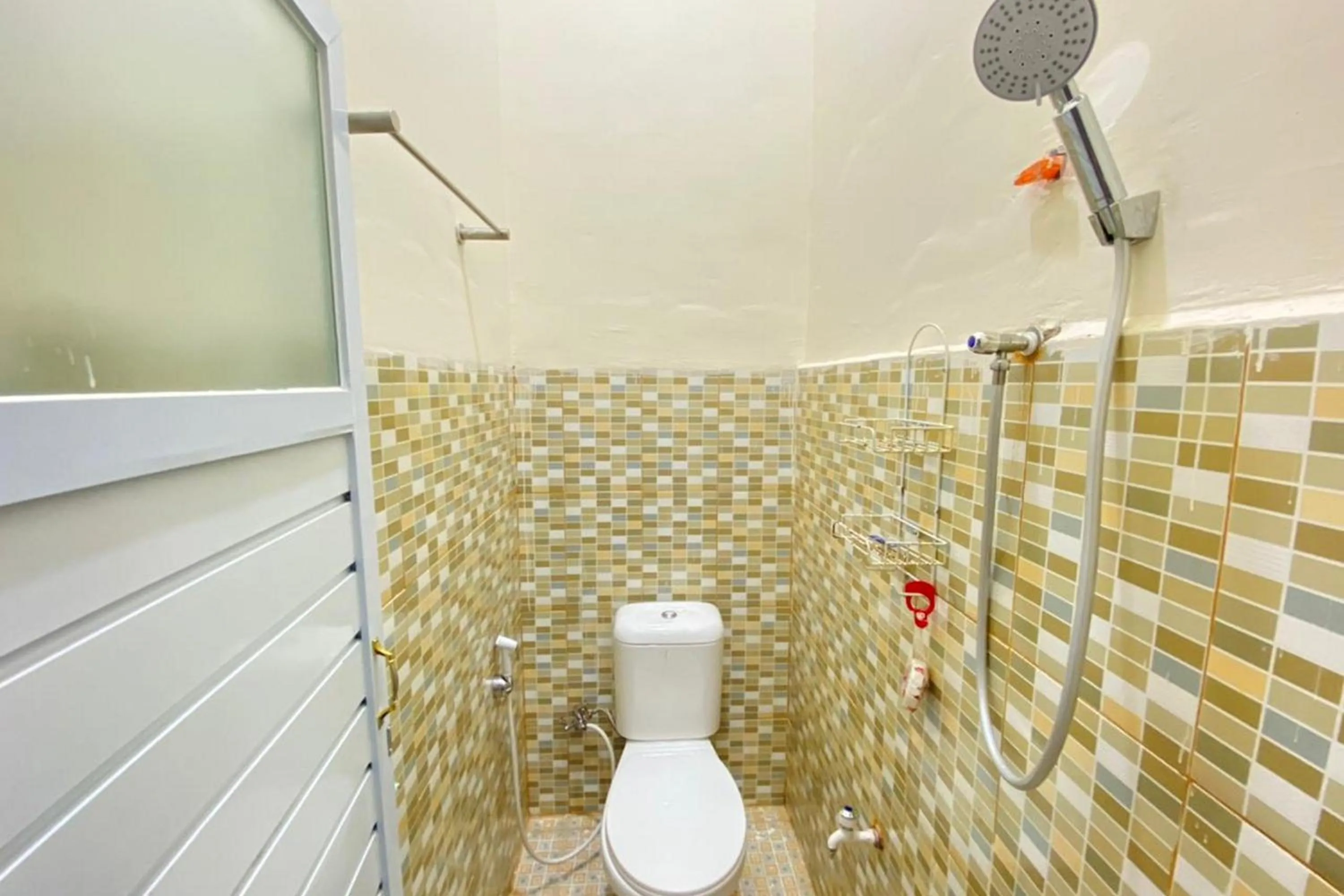 Bathroom in Pelangi Guest House Palembang RedPartner