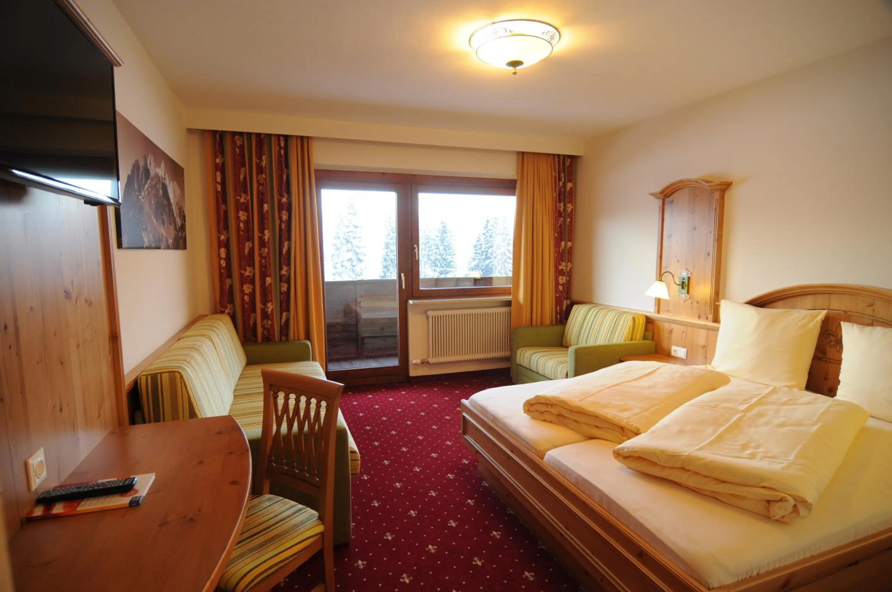 Photo of the whole room, Bed in Sporthotel Tirolerhof