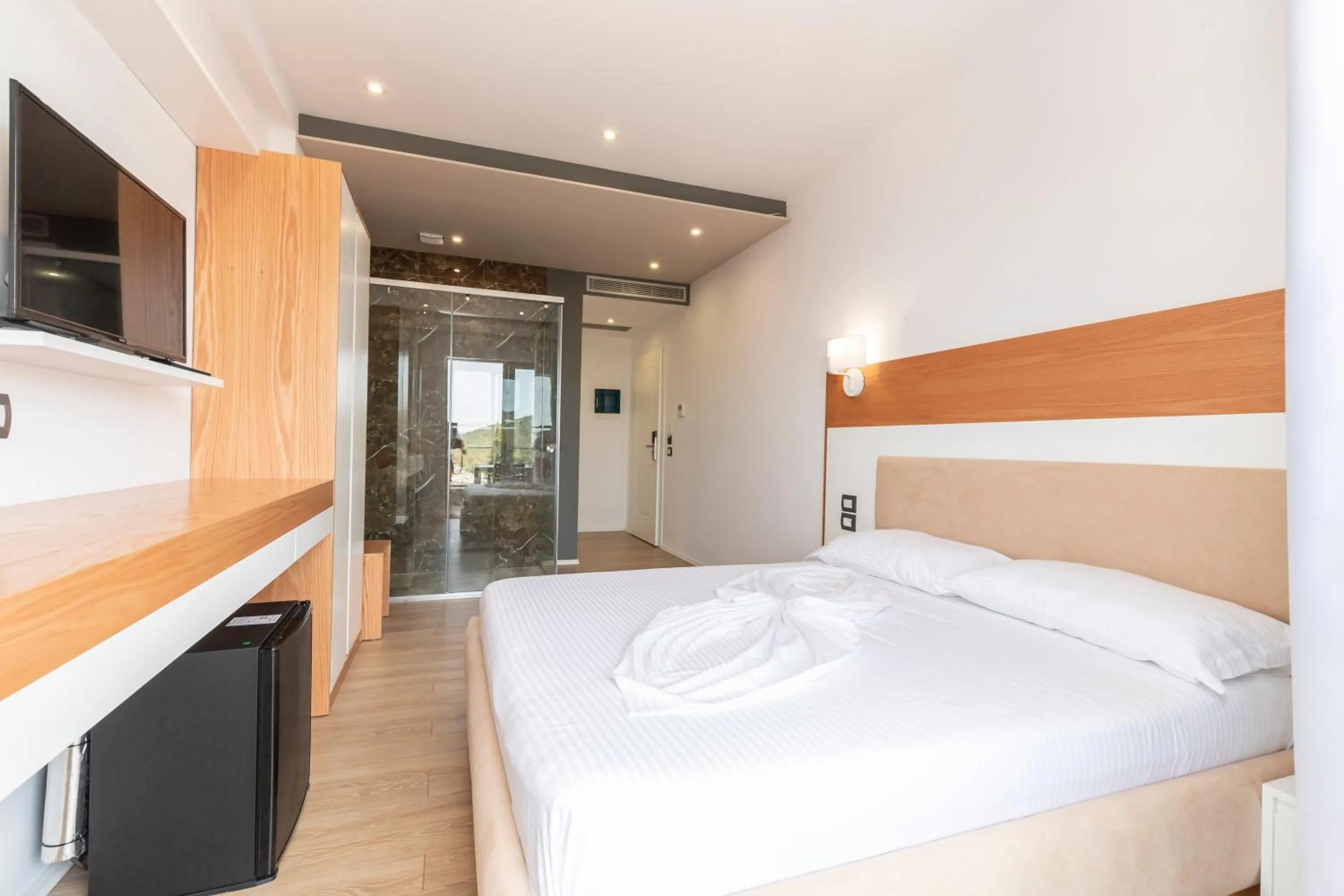 Bed in Ventus Hotel