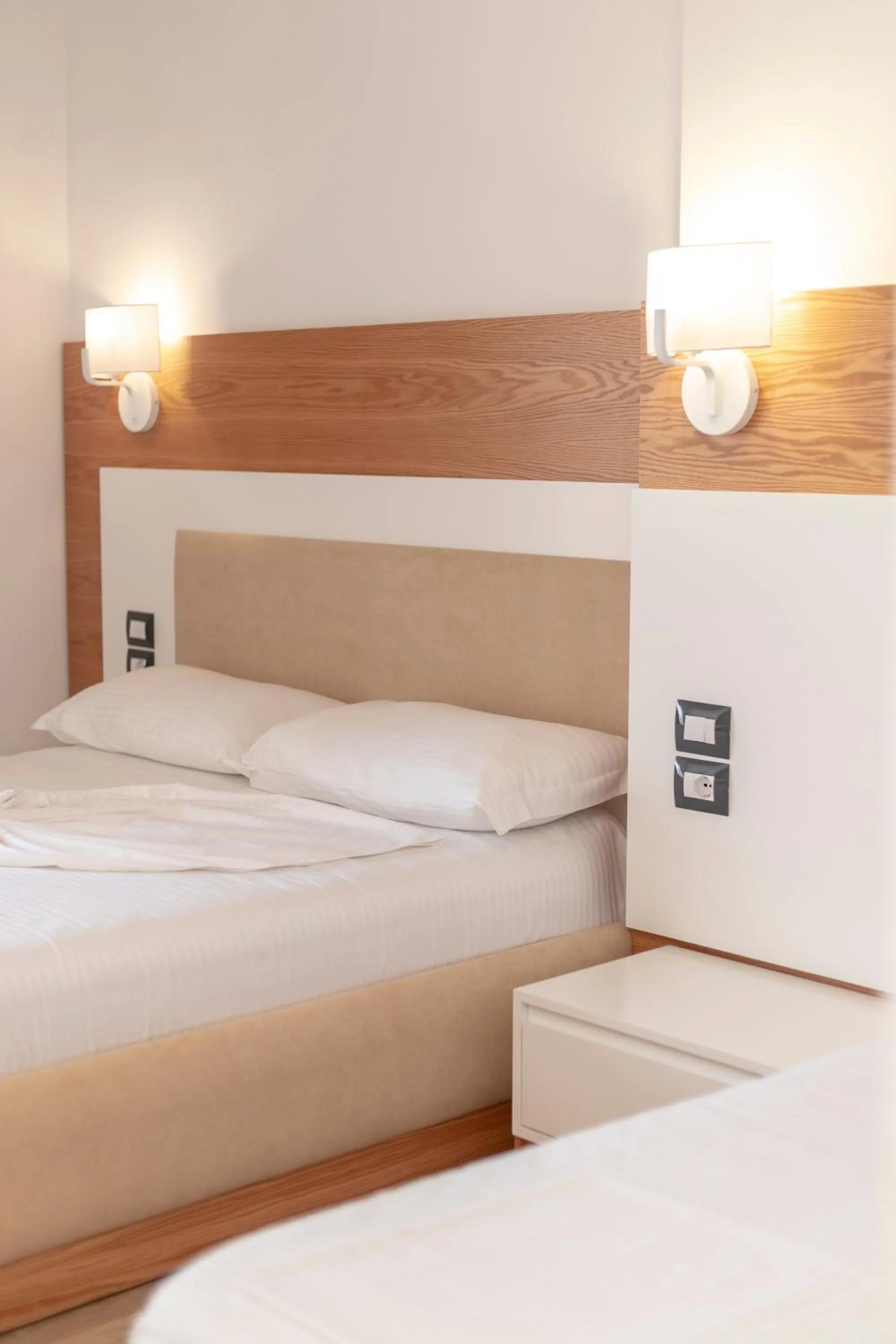 Bed in Ventus Hotel