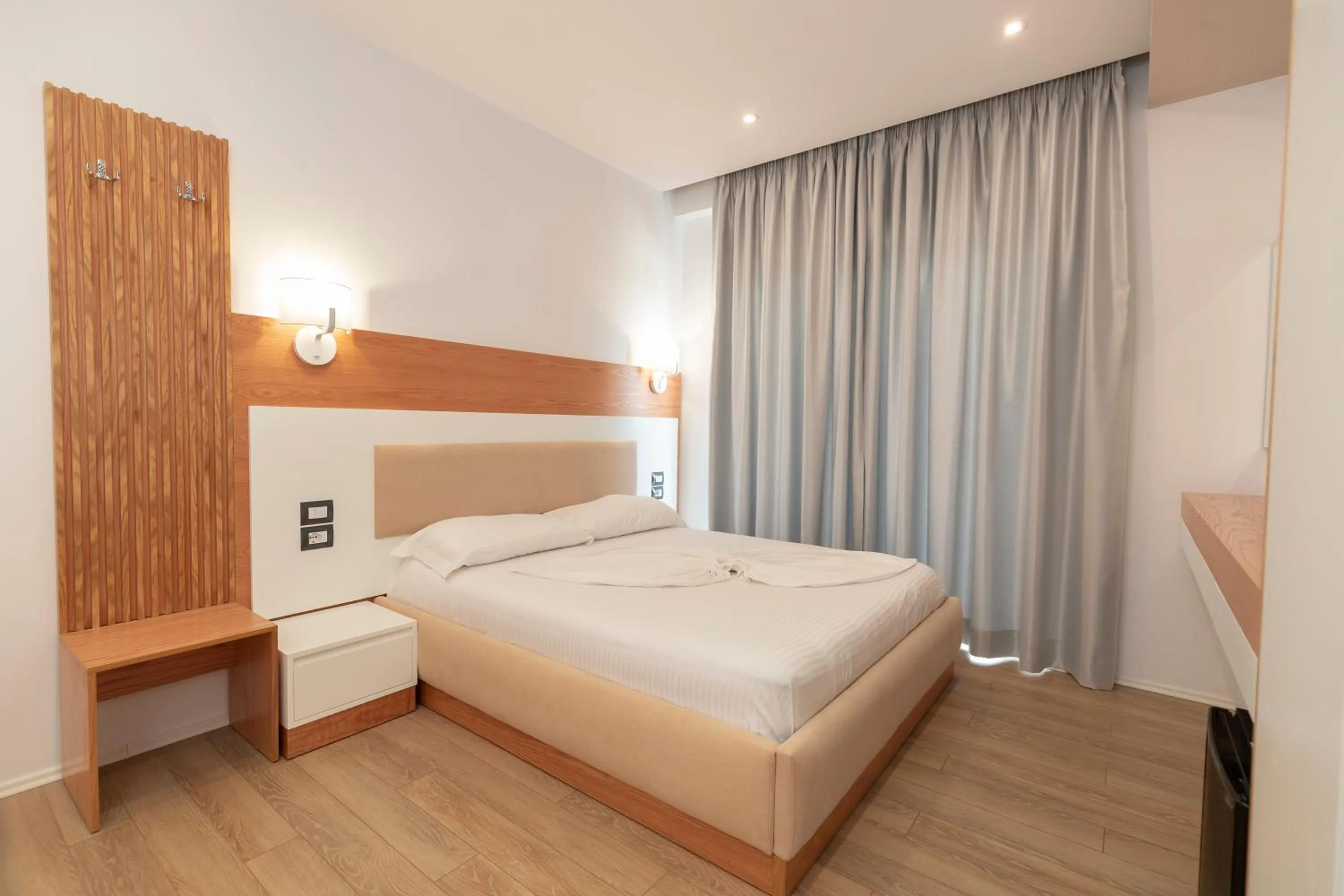 Bed in Ventus Hotel