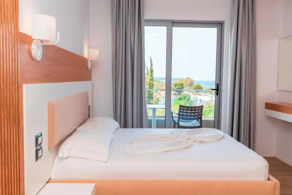 Bed in Ventus Hotel