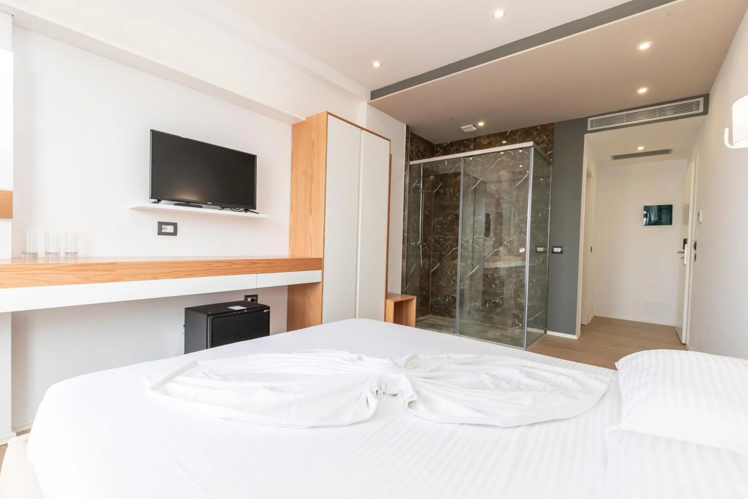Bed in Ventus Hotel