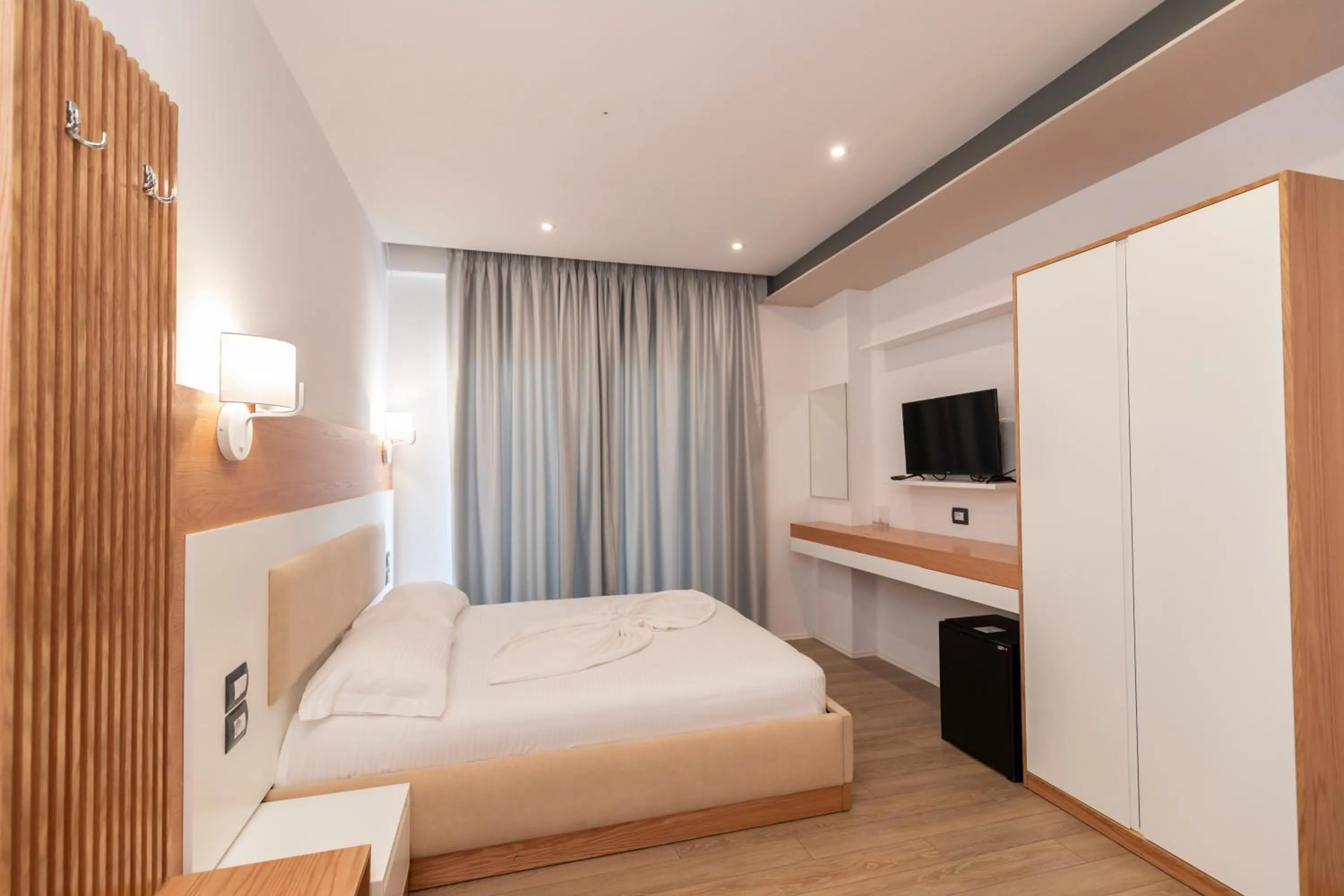 Bed in Ventus Hotel