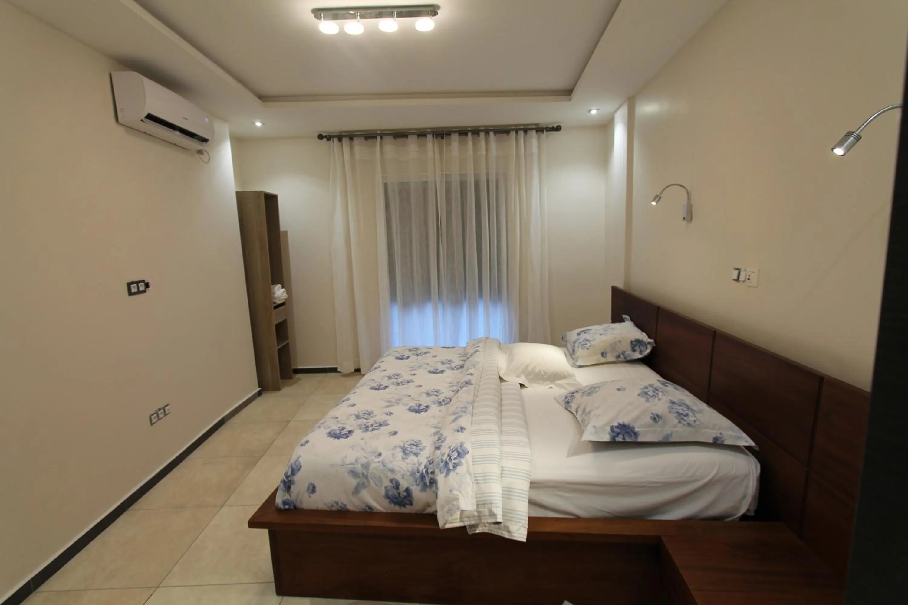 Photo of the whole room, Bed in Residence MASSOU