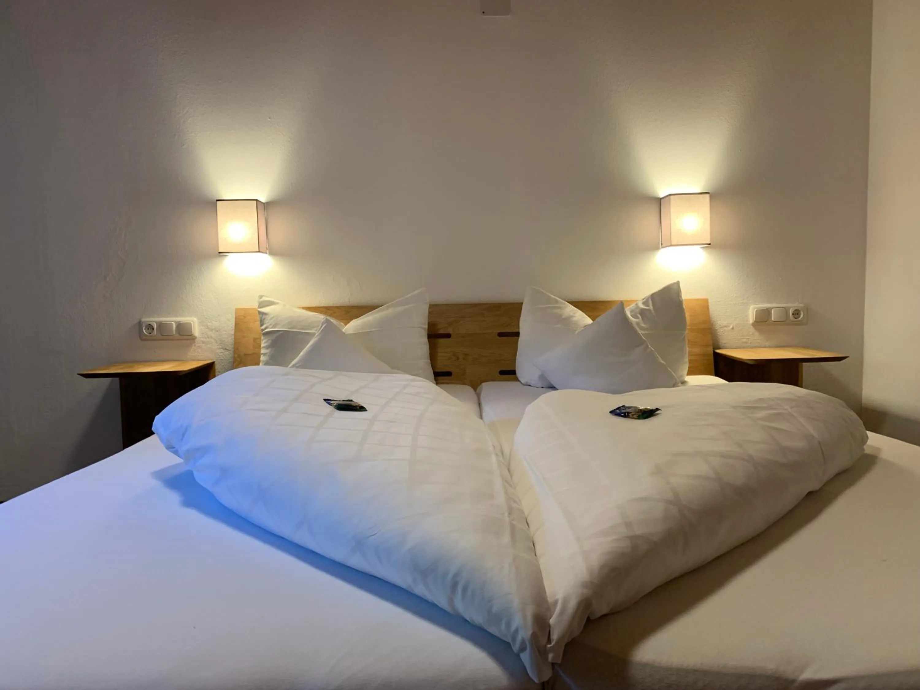 Photo of the whole room, Bed in Alpenhotel Sonneck - mit Bergbahnticket