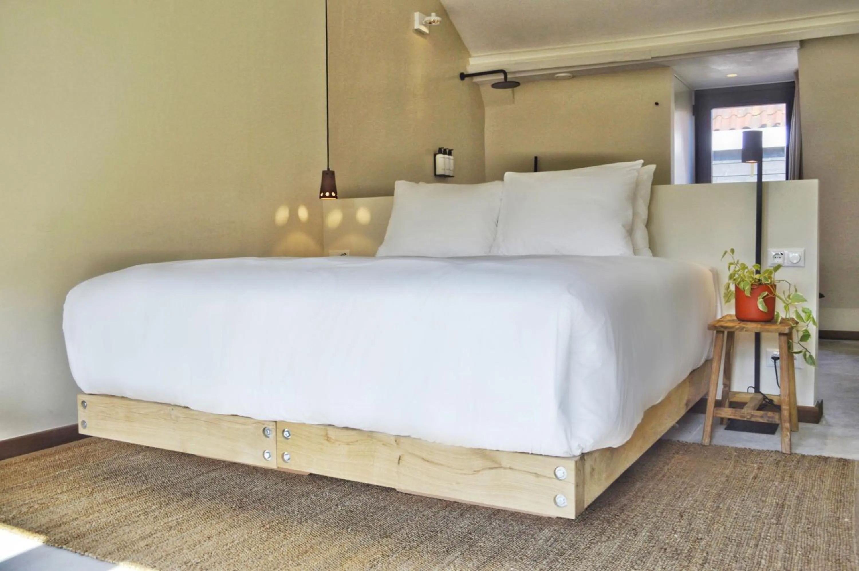 Bed in Van Heeckeren Apartments & Suites Nes