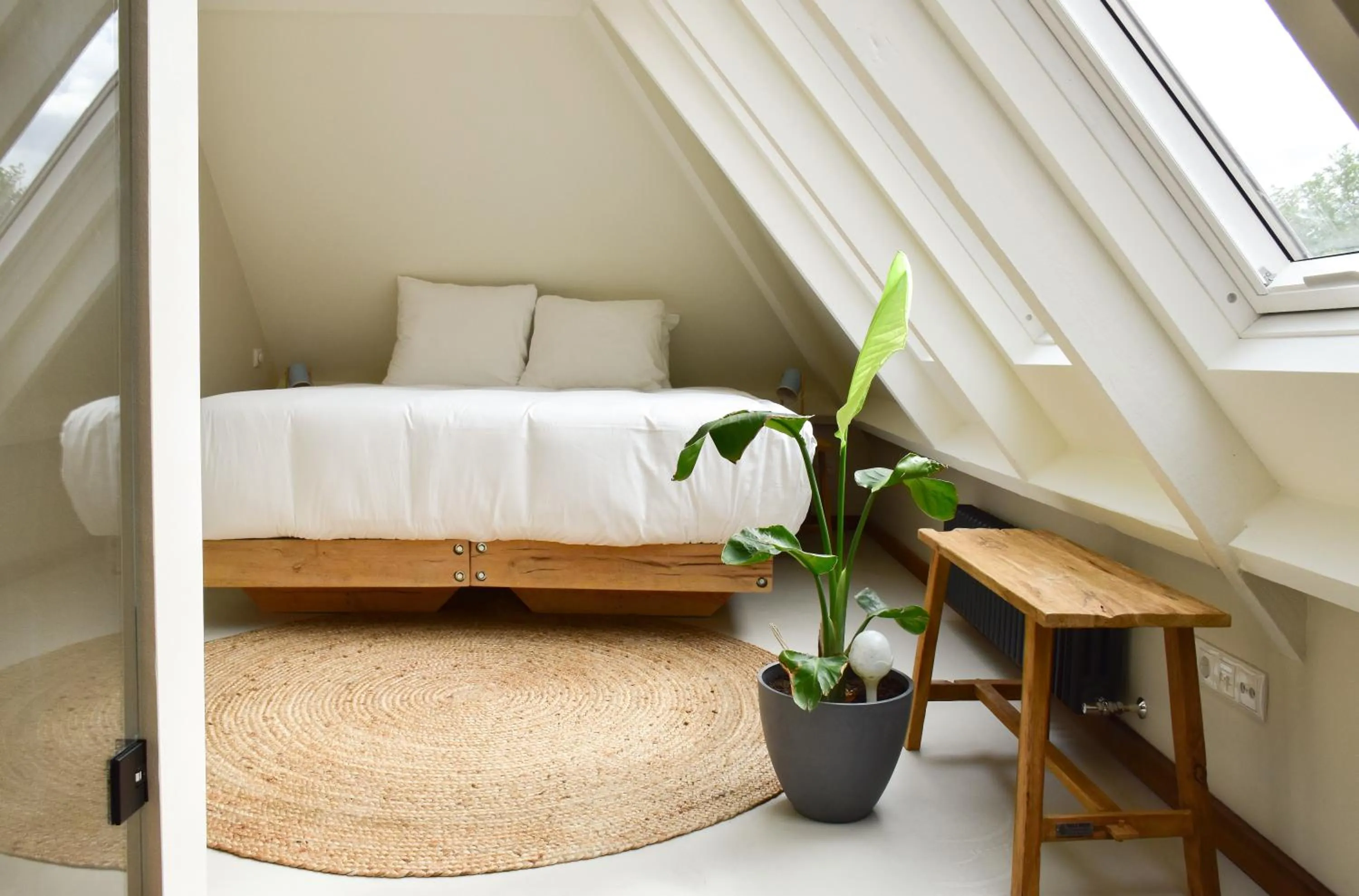 Bed in Van Heeckeren Apartments & Suites Nes