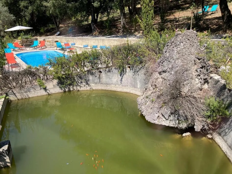 Swimming pool in Suite Royale- SPA - Jacuzzi - Sauna - Massage - 2 Double Rooms - 4 SAISONS - Piscine Chauffée Toute l'année - POOL VIEW - Heated POOL -800m City Centre