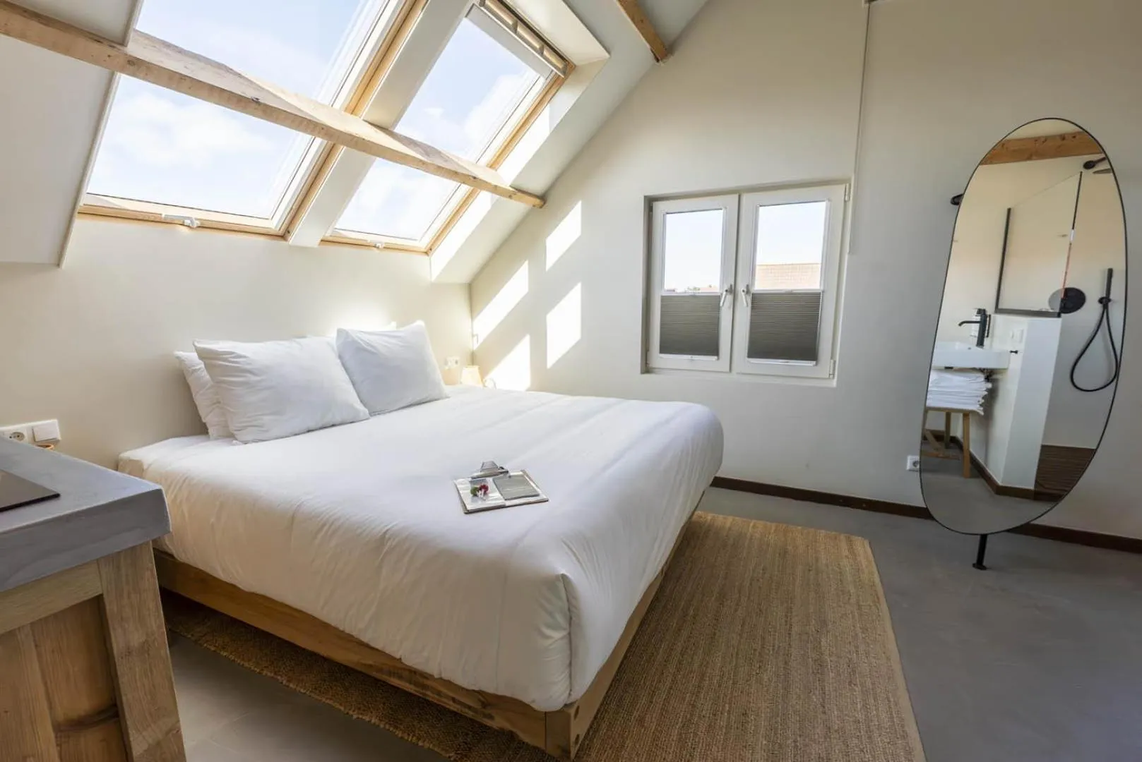 Bed in Van Heeckeren Apartments & Suites Buren