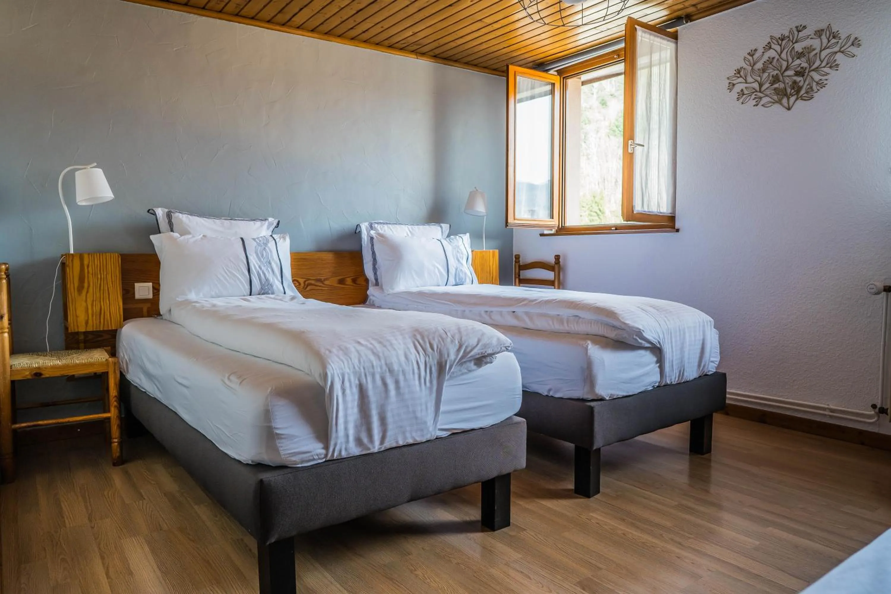 Bed in Hôtel Au Vieux Moulin