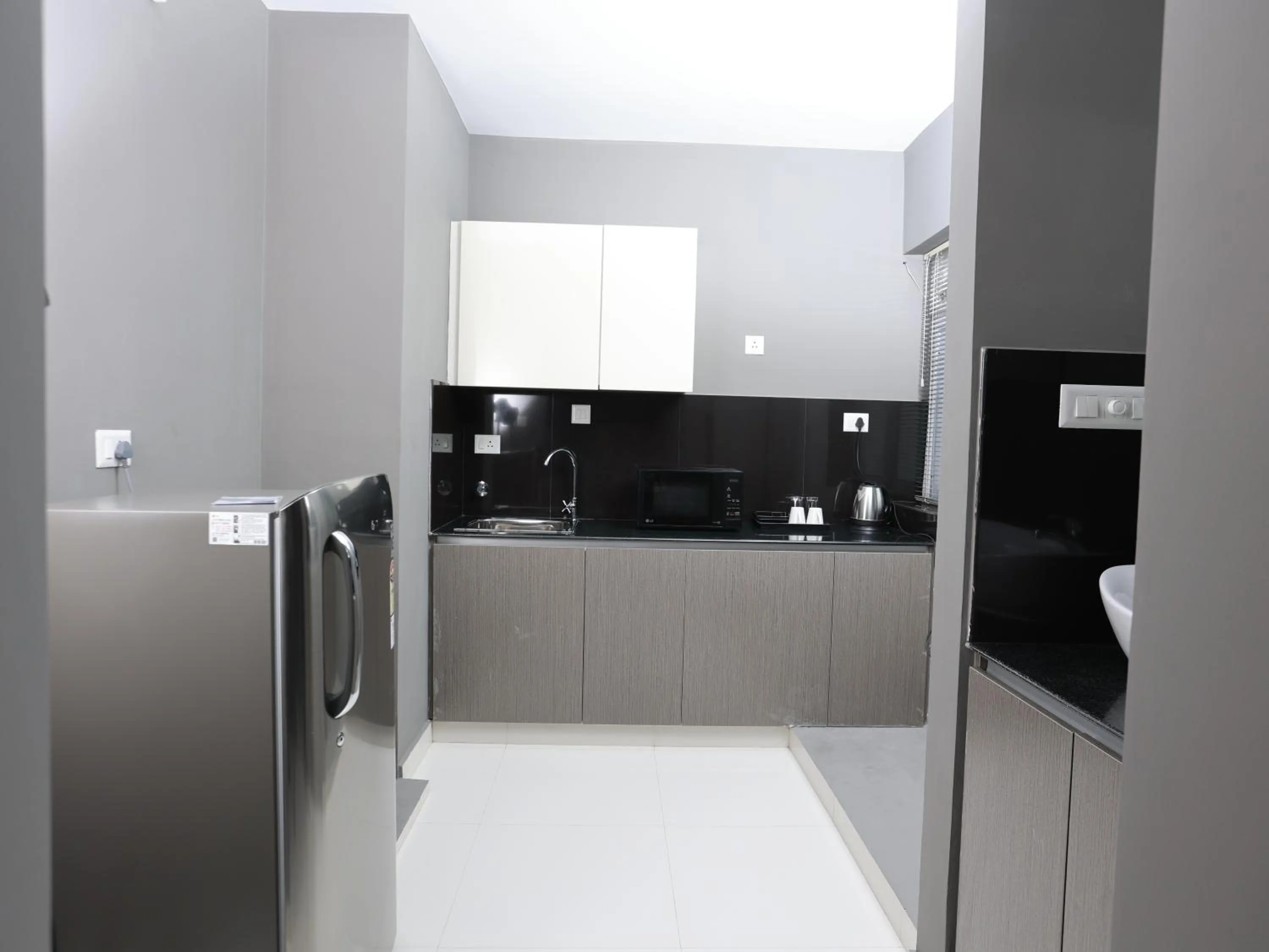 Kitchen or kitchenette in Transit Suites by GrandWest