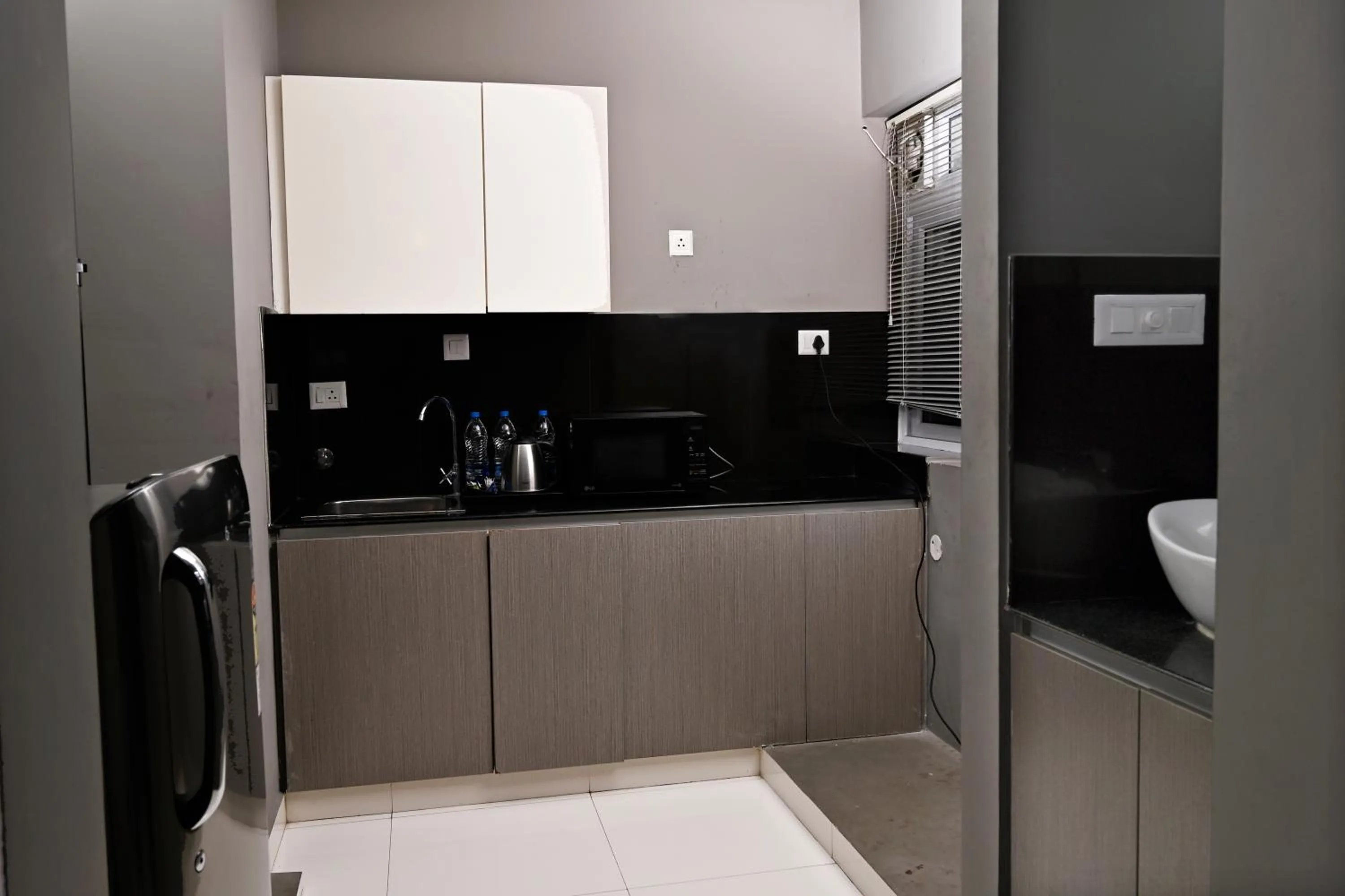 Kitchen or kitchenette in Transit Suites by GrandWest