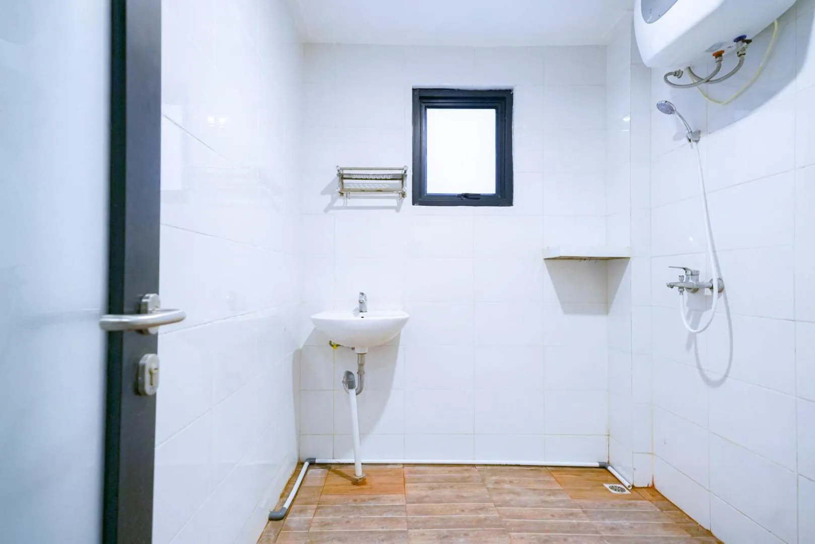 Bathroom in Urbanview Pecatu Residence Bali by RedDoorz