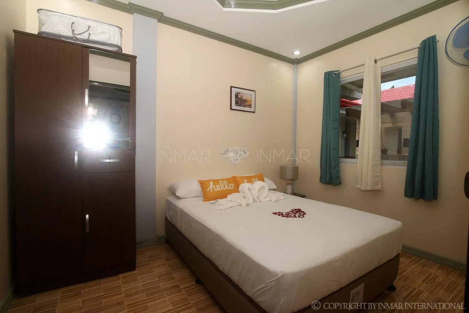 Photo of the whole room, Bed in AJ Residences Apartelle