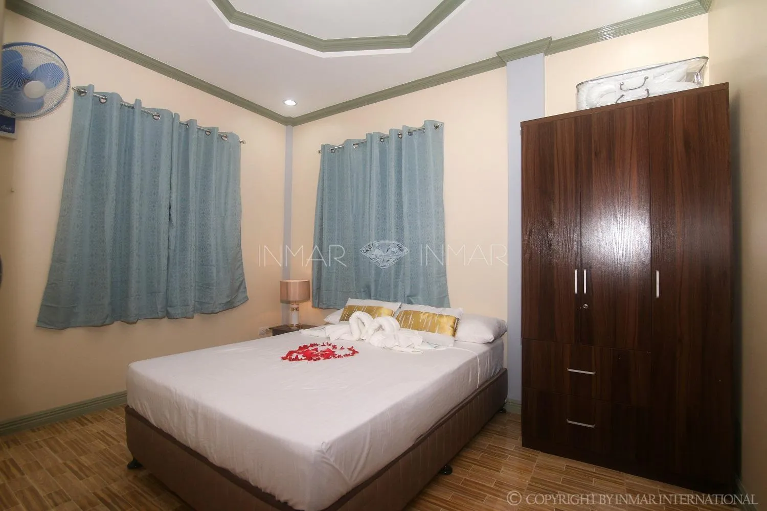 Photo of the whole room, Bed in AJ Residences Apartelle