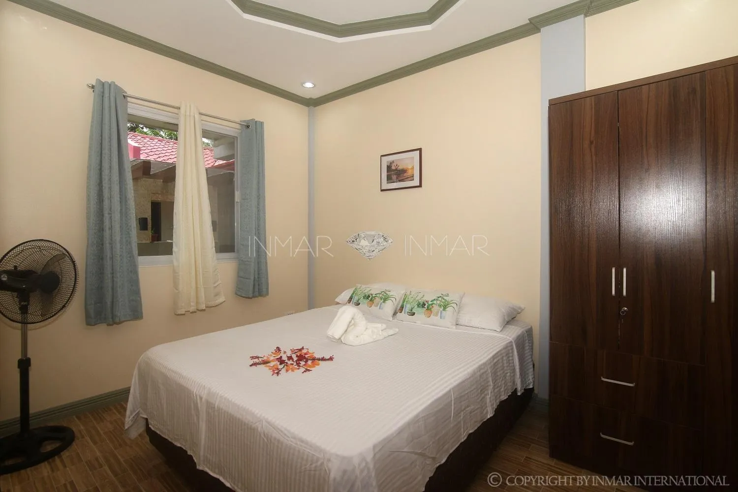 Photo of the whole room, Bed in AJ Residences Apartelle