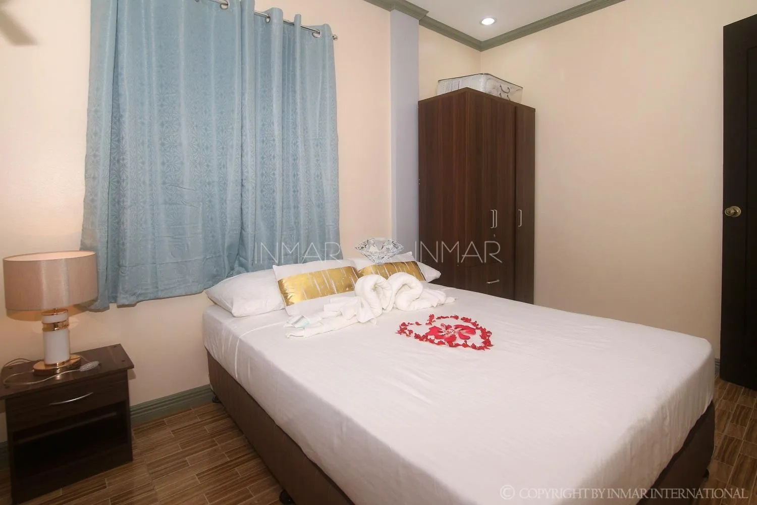 Photo of the whole room, Bed in AJ Residences Apartelle