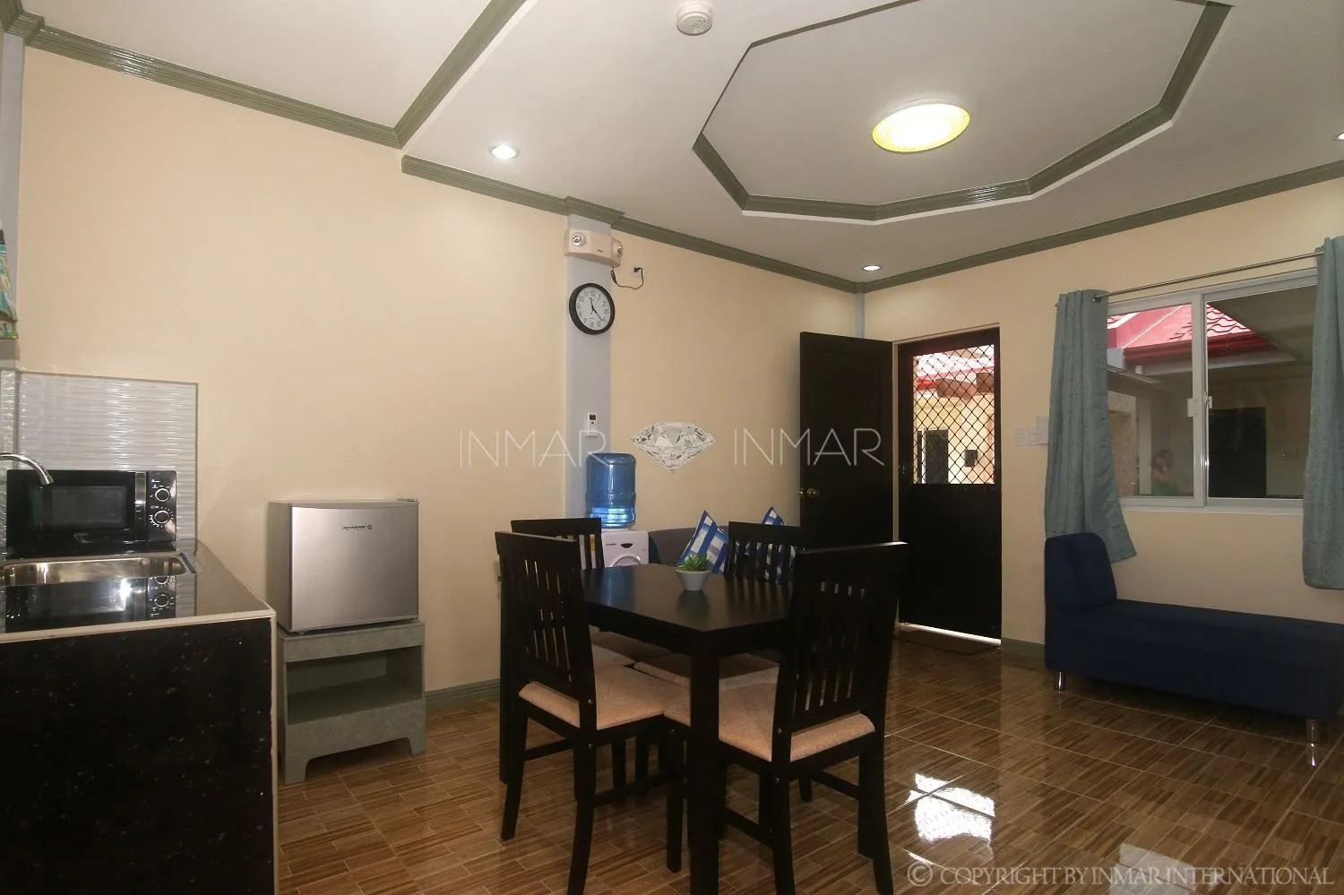 Dining area in AJ Residences Apartelle
