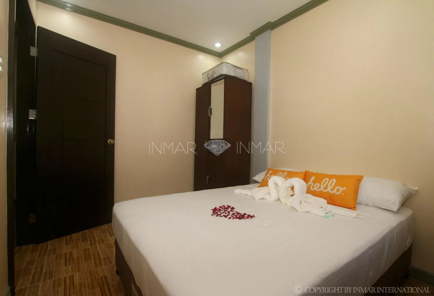 Photo of the whole room, Bed in AJ Residences Apartelle