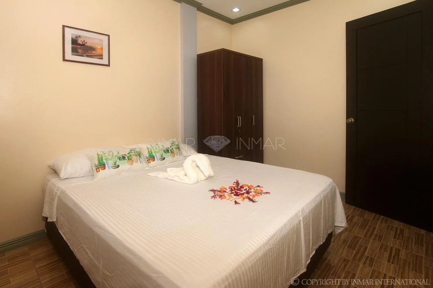 Photo of the whole room, Bed in AJ Residences Apartelle