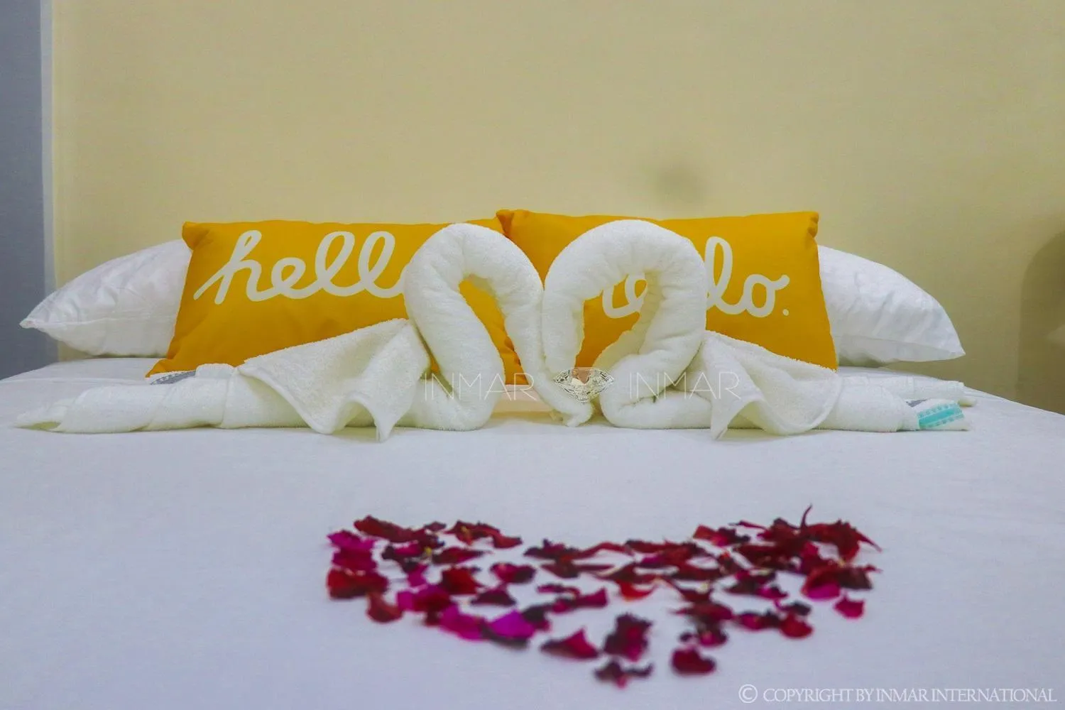 Bed in AJ Residences Apartelle