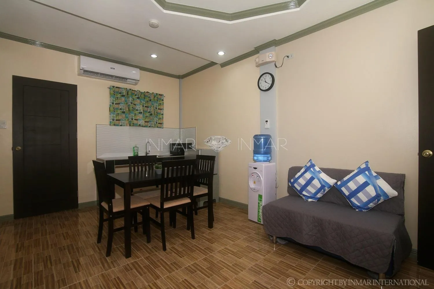 Living room, Bed in AJ Residences Apartelle