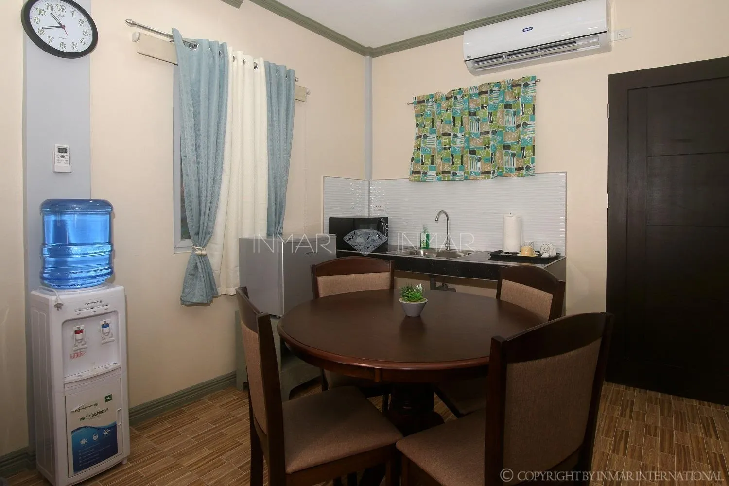 Dining area in AJ Residences Apartelle